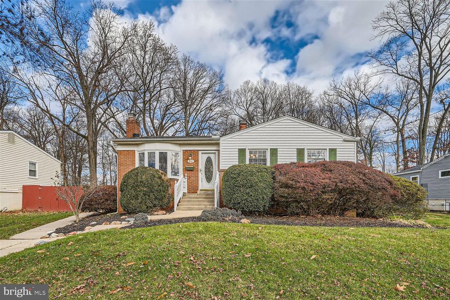 Welcome home to 214 Rolling Rd! Nestled within the peaceful and enchanting Deer Park neighborhood, this endearing home rests on an impressive HALF-ACRE of land!! An unheard-of value in a prime MoCo location at under $500k! As you open the front door, you are instantly welcomed by the warmth of NEWLY REFINISHED wood floors that extend throughout the main level, creating a seamless flow from room to room. The living room is bathed in natural light, courtesy of the large bay window. Picture yourself unwinding in this inviting space, whether engaging in lively conversations with friends or simply relaxing on the couch after a long day. Adjacent to the living room, discover the classic character of the roomy dining room. Boasting beautiful chair railings and plenty of space for hosting dinner parties or game nights, this area becomes the heart of the home—a place where connections are forged and lasting memories are made. Venture outdoors to the expansive covered deck that overlooks the sprawling fully fenced backyard, where possibilities are endless from gardening to outdoor gatherings and play. Two storage sheds! Step back inside and into the timeless charm of the sizeable kitchen, featuring an abundance of storage and a highly desired GAS RANGE for precision cooking. Down the hall, the owner's suite is a haven of tranquility, featuring ample closet space and a half bath for added privacy and convenience. Two additional well-proportioned bedrooms and a full bathroom round out the main floor. Stunning crown molding throughout the first floor. Descend to the finished walkout basement, where a cottage wood wall and brick fireplace take center stage in the generously sized family room. This inviting space is perfect for cozy evenings with loved ones, whether you're enjoying a movie night or indulging in a good book by the fire. An additional bonus room in the basement provides great versatility, serving as an ideal space for a  home office, workshop, or whatever suits your needs! The large utility room offers storage galore. NO HOA FEES! Close to major commuting routes (270, 200, Frederick Ave), Shady Grove Metro, Marc Train, Duvall & Bohrer Parks, RIO, Crown, Kentlands and so much more! Schedule your showing today!***Check out the 3-D tour!***$400 from this sale goes to Baltimore Youth!**Photos are Virtually Staged**
