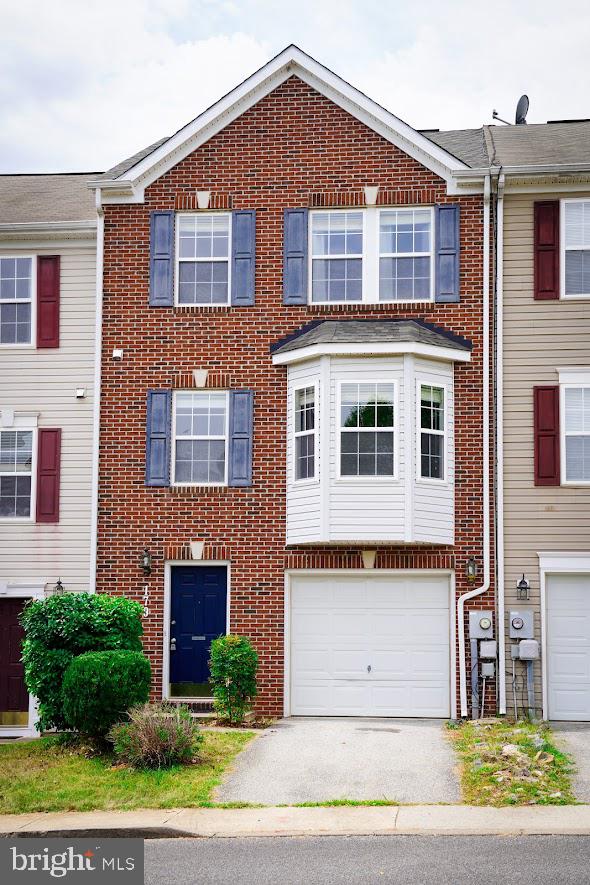 This charming County Green townhouse with a brick facade has more than 1700 square feet. 3 BR, 2 1/2 BA, classic and open floor plans are all present. When you enter through the front door, you are met with a sizable foyer with a coat closet. The eat-in kitchen with an island is modern and has a sunroom bump out and a separate dining area. The great room has lovely laminate flooring and a snug nook, among other wonderful features. A gorgeous master bedroom and master bathroom with soaking tub and double vanities are located upstairs. Bedrooms 2 and 3 are generously sized and could also be used as a study or office. If you want some privacy, head to the backyard patio, which is encircled by privacy fencing. This location is ideal for commuters to the Northern Virginia area since it is only minutes from Route 9. Schedule your showing now!