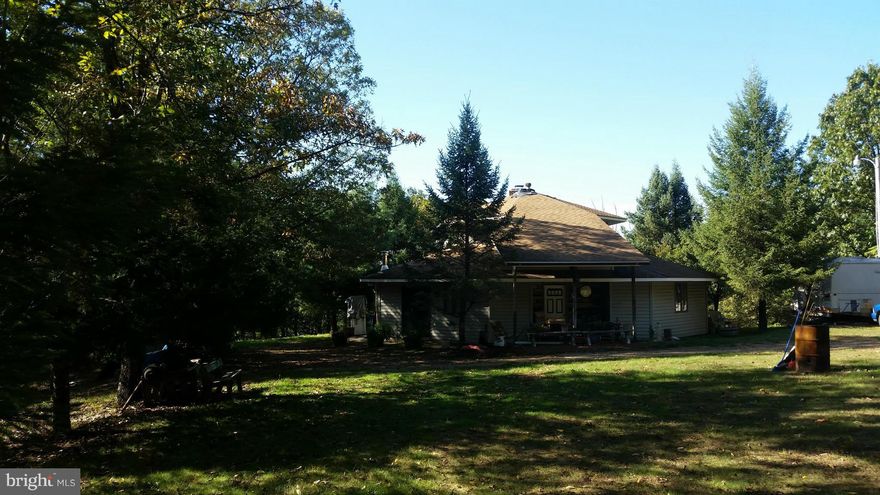 Beautiful long range views with this unique octagon home, large and spacious with over 2,000' of living area, 3bdr, 2bth, observation room, stone fireplace, oak cabinetry, Central air - heat - vac, many nice features. Setting on 5.43 acres of mostly level, unrestricted woodlands it offers much privacy. Nearly completed with only minor trim, some drywall finishing, flooring to be done. Call Today.