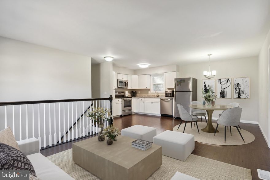 New Lower price! MOTIVATED SELLER! This 4 bedroom, 2.5 bath home is located in a highly sought-after school district; with a brand new elementary school scheduled to be finished Summer of 2023. The house was renovated from top to bottom in 2019 with a new roof, paint, hardwood floors, carpet, doors, windows, tiled bathrooms, new kitchen cabinets with granite countertops, stainless steel appliances in an open concept living space. You'll also find a deck off the living space that allows for a grilling area, maybe set up some patio furniture to have an evening drink or morning coffee while appreciating the Bay breezes. The 4th bedroom downstairs allows for a teen retreat, a private space for guests or a home office. Here you'll also find an oversized rec room that could be a second living space, pool table and bar area or a play area for young children. You'll find this house is only minutes from Chesapeake Beach and North Beach recreation areas, restaurants, casino, marina, waterpark and the shimmering Chesapeake Bay. Seller is willing to offer a home warranty to give buyer extra piece of mind.