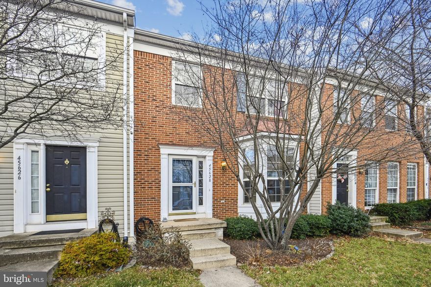 Exceptional 3 bed, 3.5 bath colonial townhouse in an amenity-rich neighborhood boasting a clubhouse, pool, playground & tennis court. This homes formal entry welcomes you into an open living & dining room layout with wood floors, recessed lighting, well-placed neutral accents & windows that flood the rooms with beautiful natural light. At the heart of the home sits a spacious white kitchen with stainless steel appliances & ample storage. A primary suite is tucked away on the upper level with walk-in closet & ensuite featuring double sinks, soaking tub & separate shower. The finished lower level is complemented by a rec room that expands your living space including the convenience of a full bath, and an additional room perfect for guests, home office or a workout room. The outdoors space offers a large upper deck accessed from the living room, lower patio & fenced yard. Schedule your tour today!