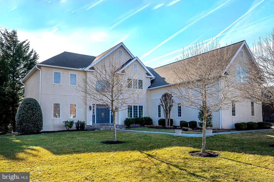 Spacious Colonial in highly sought after community of Greens at Waynesboro.  This one is truly special.  Continuously updated over the years, the amenities of this home rival new construction.  Enter into a 2 story center hall foyer  with grand center staircase, flanked by the Formal Living Room and Dining Room.  Straight ahead is the oversized Family Room with Cathedral Ceiling, This room is bathed in natural sunlight from the extensive soaring windows .  There is an impressive 2 story stone fireplace with a gas insert for cozy days and nights.  The den/office has custom builtins, and can be closed off with glass French Doors for privacy .  The updated kitchen is a gourmet's dream and truly the pinnacle of this home.  Beautiful cabinetry, professional appliances, including a 6 burner double oven Viking range and hood, Subzero refrigerator.  The extensive counters are honed granite.  So many custom features including a second sink, in the beautiful wetbar/working area, and a large pantry.  There is counter seating at the elongated island and a breakfast room that links this space with the family room. This is the open floor plan everyone loves!   A new composite deck and covered back porch connect and expand the living area, and offer more space to relax and entertain.   The view here will impress.  Lovely landscaping frames the view of open space with a front row seat for sunsets.  There are several raised gardens for the gardening enthusiast, as well as mature trees that screen the property and create privacy. 
A newly remodeled mud room and separate laundry room complete this level.  
Ascending to the second floor via the grand staircase or the back stairs, the hardwood floors and beautiful moldings continue.  The balcony view into the 2 story family room with its wall of windows is impressive.  The luxurious primary is incredibly spacious and  consists of an oversized bedroom with vaulted ceiling, an auxiliary room that could be another bedroom, office or quiet meditation room.    There is a dressing area with vanity and  4 walk in closets!  The primary bathroom has been sumptuously updated to include heated floors,  soaking tub, separate commode, and double vanity.  Bedroom #2 is a princess suite with an ensuite updated bath and walk in closet.  Bedrooms #3 and #4 share a Jack and Jill Bathroom.  The lower level is completely finished and walks out to the yard.  
This home has it all.  Great location, established neighborhood with sidewalks, open space and a walking loop. Top rated schools! Not to mention that all of the systems, including the roof and the Heat and Air conditioners are also update.   Don't miss it! Showings begin on Friday 3/18 at noon.