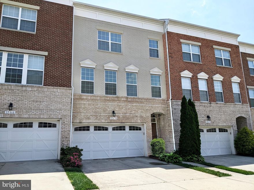 Spectacular luxury townhouse in the sought-after Brambleton community. Move-In ready with fresh paint and new flooring throughout. You will love the open floor plan on the main level with a sun-filled living room which flows seamlessly into the dining room, perfect for entertaining. Just off the living room is a short hallway with large storage closet and a powder room at the end. The gourmet kitchen features stainless steel appliances, built-in microwave, granite countertops, recessed lights, center island, generous pantry and large breakfast area. Just off the kitchen you can enjoy a morning coffee or evening wine on the composite deck with tranquil views of trees. The primary bedroom is accented by a tray ceiling, three windows for great natural light and a large walk-in closet. The primary bathroom has all the comforts of a luxury townhouse including dual-sink vanity, large corner soaking tub, separate shower and private water closet. Enjoy the convenience of the bedroom-level laundry. The lower level provides great additional living space with a half bath and a recreation room which walks out to the fully fenced back yard. A commuter’s dream just minutes from the new Silver Line Metro Station and easy access to major routes including Dulles Toll Road and Loudoun County Parkway. All this plus all the amenities that Brambleton offers