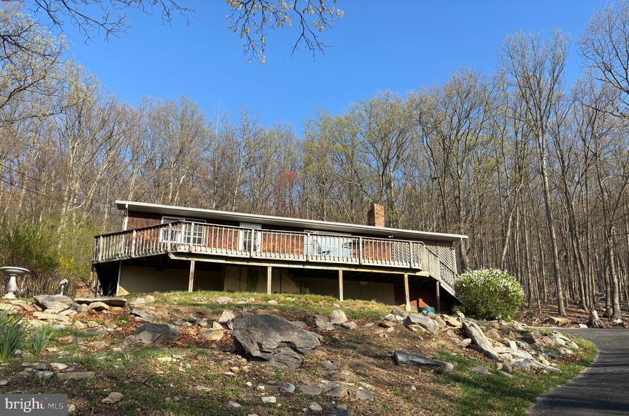 Welcome to 212 Skyline Trail—an incredible opportunity nestled in the scenic hills of Harpers Ferry. This two-bedroom, one-bath rancher sits on over three acres, spread across five separate parcels—four of which are contiguous, and the fifth located directly across the street. That parcel could be partially cleared to enhance your seasonal mountain views.

The property backs to the Appalachian Trail, offering direct access to one of the most iconic hiking routes in the country—ideal for nature lovers and outdoor enthusiasts. The state-maintained roads ensure reliable year-round access, and high-speed Comcast internet delivers blazing-fast service with up to 1200 Mbps, perfect for remote work or streaming.

While the home has not been recently updated, it offers fantastic potential to renovate and customize. The surrounding land provides space, privacy, and possible subdivision potential, making this a versatile investment opportunity.

Whether you’re looking for a peaceful full-time residence, a weekend retreat, or a property with future development options, 212 Skyline Trail is a rare find in a truly beautiful setting.

Schedule your showing today and explore the possibilities!
*Professional photos will be uploaded before property goes Active