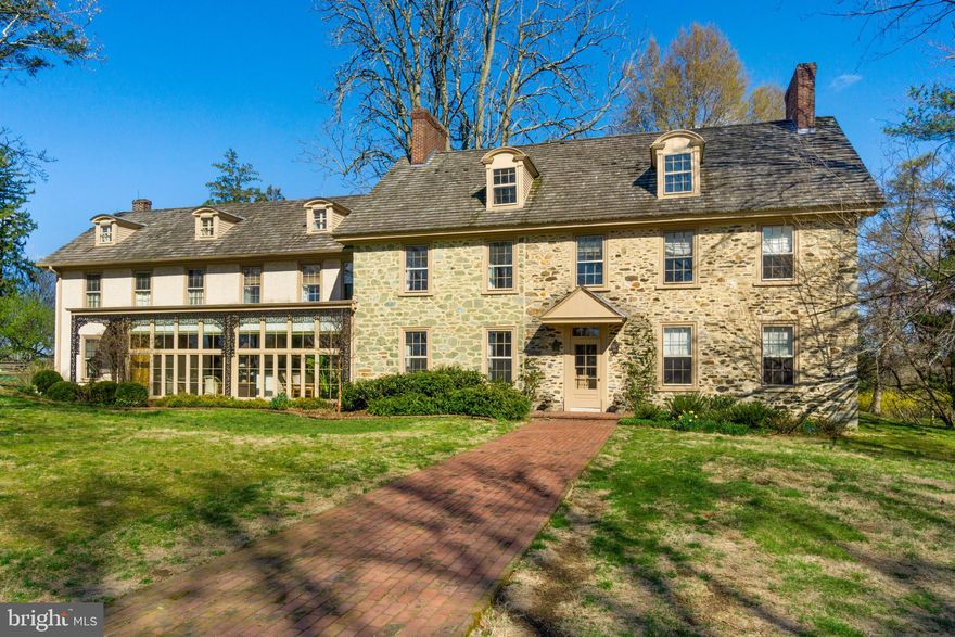 As featured in Philly Magazine! Constructed in 1775 with an c.1833 addition, this marvelous five bedroom, 6.2 bath home boasts the finest museum quality mantels and moldings of any home currently on the market. Many of the seven mantels and much of the moldings in the Foyer and common rooms could easily find their way to Winterthur - they are positively exquisite! Examples of these works of art are displayed immediately upon entry. The Foyer is divided into two sections - an entry and a staircase which are separated by a magnificent flat arch handcrafted with intricate carvings, dental, and gouge work. The chair rail that tops the wainscoting, as well as the crown moldings, are also works of art! The Living Room adjoins the Music Room creating a large space and both access the large Foyer creating a large space for entertaining. The spacious Dining Room and Den also access the Foyer. The totally updated chef's Kitchen features high-end Thermador, Kitchen Aid, and Sub Zero appliances and vast amounts of magnificent marble countertops. The large Family Room accesses the Kitchen and Foyer as well as the Mud Room and Office. On the south end of the Family Room is an area with a travertine and marble floor - a perfect growing area for your favorite plants. Both the Mud Room and Office access the brick walkway to the pool and patio. Upstairs houses a Master Suite plus four additional bedrooms, some of which have an en-suite bath. This historic property is available in several different configurations depending on the amount of ground purchased. There is a large structure that was formerly a stable and can be easily reconfigured for a multitude of purposes. Convenient to shopping, schools, Rt. 202, Wilmington, and the Philadelphia Airport, this is an impressive home that awaits a buyer who appreciates the grand, artful, unparalleled features this home possesses. Showings begin after Easter Monday.