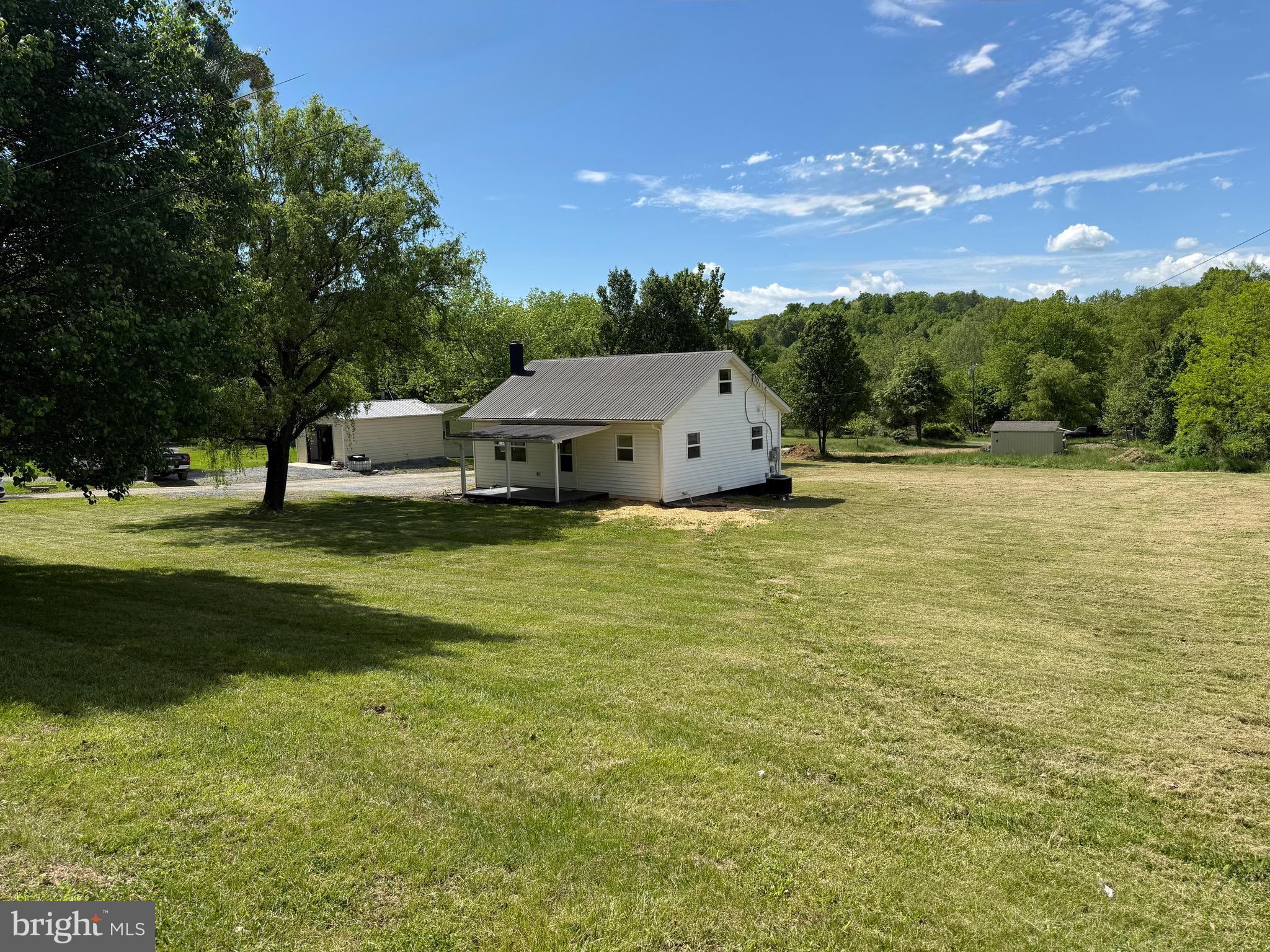 Unrestricted! No HOA! This Cape Cod has just been rehabbed! There are 2 Bedrooms and 1 bathroom on the main level with a fully finished attic to give you that added room you desire. You'll appreciate the beautiful .58ac level corner lot that offers plenty of room to enjoy and grow. Brand new rear deck. Plenty of parking. Inside this rural gem you'll find the main living areas rehabbed like new! The kitchen has brand new stainless appliances and granite countertop. This home has brand new luxury vinyl plank flooring, carpeting, painting and light fixtures throughout! The modern bathroom is all new from floor to ceiling. Upstairs you'll find the fully finished attic that conveniently serves as additional living space! Speaking of additional space, there is a full basement with washer/dryer hook-up and plenty of space for storage. Upgraded 200 amp electrical service! AFFORDABLE, unrestricted living less than 10 miles from I-81! This is the one you've been waiting for!