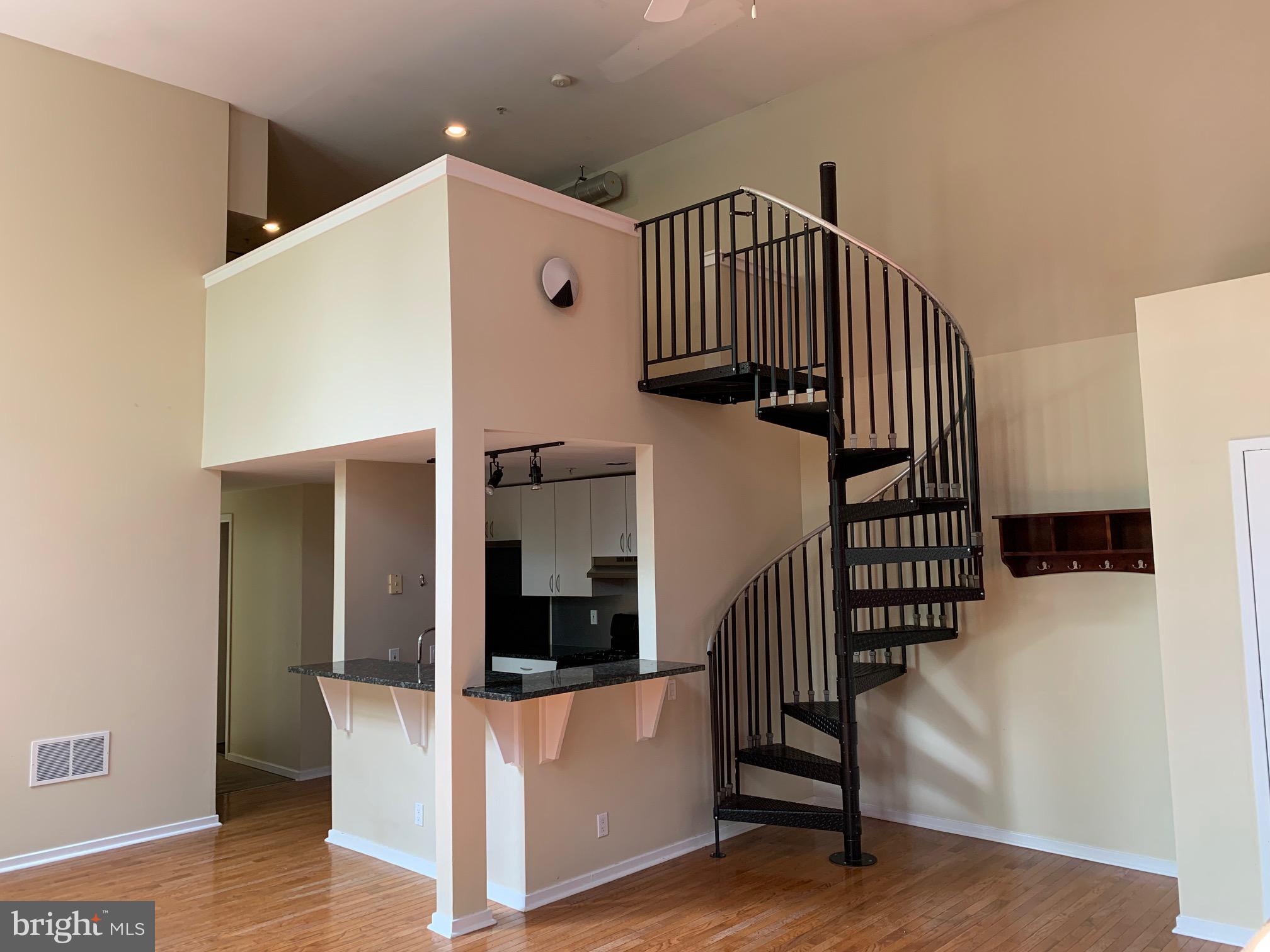 Welcome to Nob Hill in the desirable Manayunk section of Philadelphia! This beautiful 2 bedroom condominium has an open floor plan with hardwood flooring through out main living area. The kitchen has a breakfast bar and all stainless steel appliances. Cozy up during the chilly months with a gas fireplace. The spiral staircase leads to a spacious loft area. Enjoy abundant natural light courtesy of high ceilings and large windows. Don't forget the common picnic area with grill is perfect for gathering together. Come out and see all Nob Hill has to offer. Make 306 your home today!