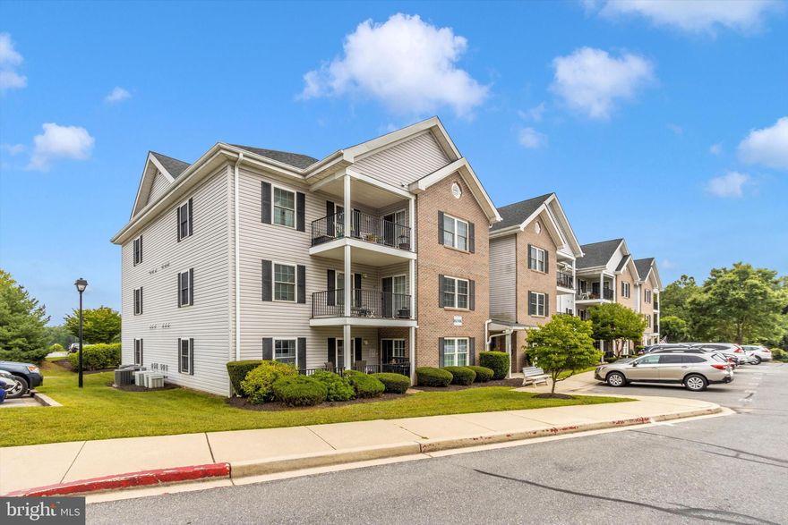 Wonderful 2 Bedroom, 2 Bath, 3rd-Floor Condominium in Sought-After 55+ Nells Acres. Lovingly Cared-for by Original Owner with Neutral Decor, Brand New Carpet and Freshly Painted Walls throughout. Functional Floorplan with Nice Flow from Kitchen to Large Dining Area that Opens to the Living Room. The Spacious Primary Bedroom Suite has a Full Bathroom with Laundry, plus a Large Walk-In Closet. The 2nd Bedroom can be used as an Office, Den or Guest Room, plus there is another Full Hall Bath and Utility Room Located just off the Kitchen. Enjoy your Morning Coffee on your Covered Balcony with a View of Mature Trees. This Top-Floor Unit includes a Deeded Parking Space right next to the Building and an Assigned Basement Storage Unit.  Secure, Covered Front Entry to Building Lobby with Elevator Access to all Floors. The Building has Recently Been Improved with New Decking on the Balconies, New Lobby Carpeting and a New Roof.  The Community Center offers a Library, Exercise Equipment, Game Tables and Party Room, plus the Guest/visitor parking is right around the corner.