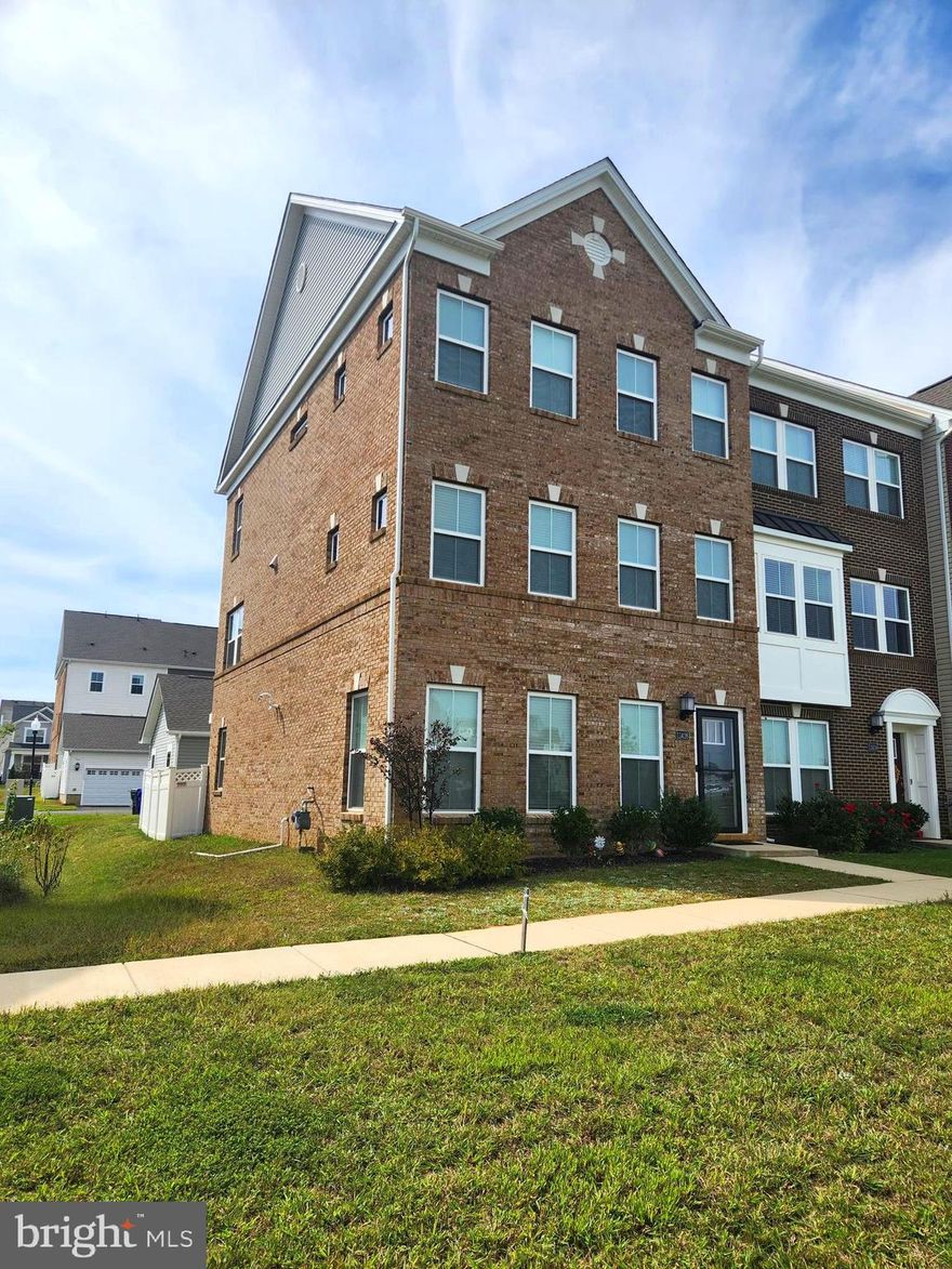 “Buyer’s home-sale contingency did not materialize. Great opportunity—home is available again!” Stunning 4BR, 3.5BA End-Unit Townhome – Built in 2022 & Move-In Ready! This beautiful end-unit townhome features a bright, open floor plan w/recessed lighting and luxury vinyl plank flooring. The gourmet kitchen boasts a large 14 ft center island, stainless steel appliances, walk-in pantry, and flows into the dining area with access to a new 8 X10 deck with privacy fence(2023). Upstairs offers a spacious primary suite with tray ceiling, and an oversized walk-in closet offering extensive storage and spa-like bath. Two additional bedrooms and a full bath complete the upper level. The finished lower level includes a bedroom, full bath, and garage access—plus a walk-out to a fenced backyard. The home also includes a 2-car garage, and an extended driveway providing a total of four parking spaces. The amenities include a large community swimming pool, expansive fitness center, clubhouse, and numerous sidewalks, walking paths, and playgrounds. Ideally situated near shopping, dining, parks, golf courses as well as major commuter routes (Route 301 & Route 5). Don’t miss this incredible opportunity to own a spacious, modern townhome in a prime location. Schedule your private tour today!