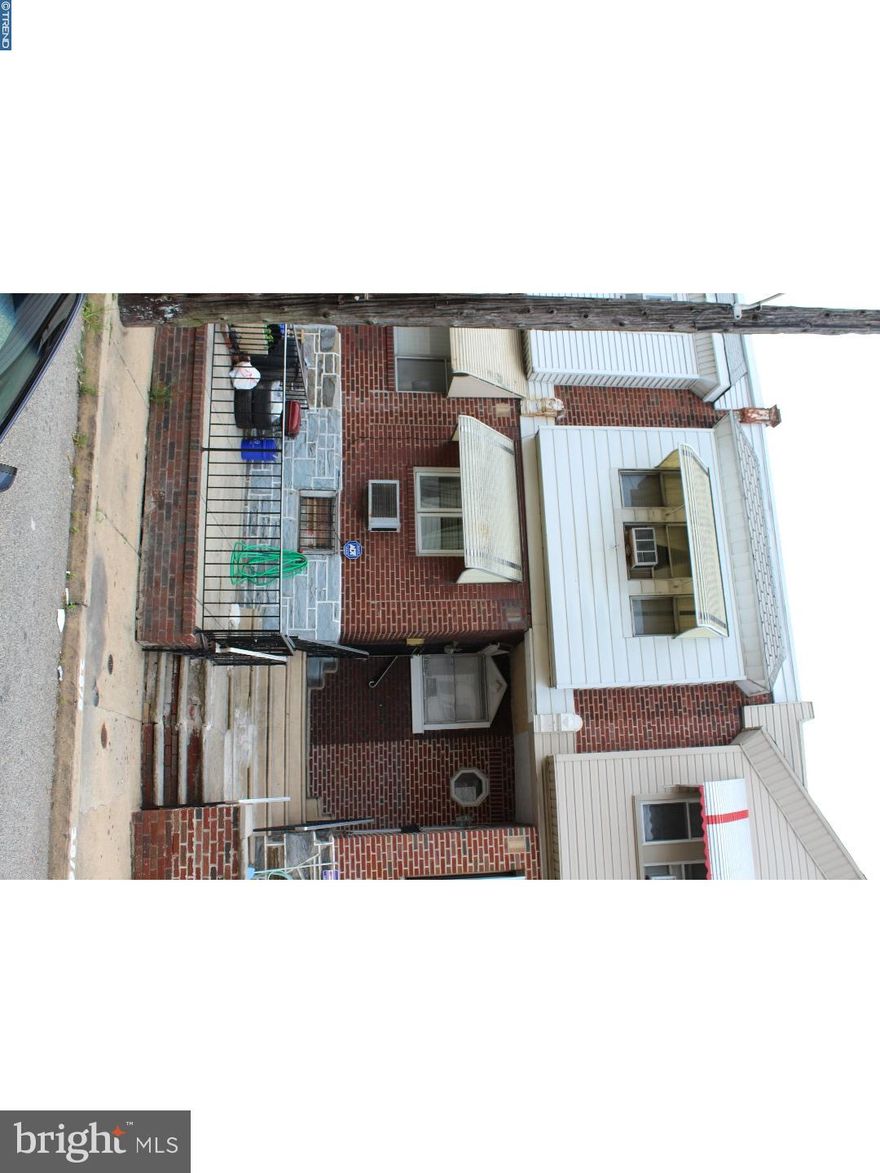 Great South Philly opportunity right here! Located 2 blocks off of Oregon Ave at about 7th St. Conveniently located just a few blocks away from the Whitman Plaza shopping center. This home consists of 3 bedrooms, 1 full bathroom, and 1 half bathroom. Walk in to a spacious hardwood living room/dining area. Continue in to a nicely sized traditional kitchen with wooden cabinets, roomy counter top & and a gas range. This house has a full carpeted basement which was once a basement/garage, however the garage was removed and now it is a full basement, with a half bathroom, laundry hookups, and a 1 year-old water heater. Upstairs offers 3 bedrooms with individual closet space. Main bedroom has carpet flooring with engineered wooden panels for walls. 1 traditional full bathroom with tile walls above the tub. This property comes with radiator heating. There is a possibility of parking one small car at the rear of the house. Property being sold in an AS-IS condition. Great for investors and Home Buyers!
