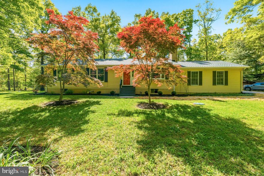 10820 Gambrill Park Rd offers the rare combination of privacy, usable acreage, and extensive recent improvements — all nestled on 5.3 wooded acres with a peaceful natural setting and healthy mature trees. This well-maintained ranch-style home features 3 bedrooms, 2 full baths, hardwood floors, and comfortable one-level living with additional flexible space in the improved lower level.

Recent major updates include a brand-new CertainTeed architectural roof, extensive interior and exterior painting, refinished hardwood flooring, new storm and screen doors, updated porch and patio improvements, landscaping enhancements, and numerous system upgrades. The owners have also installed a high-efficiency LPG furnace with privately owned 1,000-gallon propane tank, along with replacing nearly all water utility components and multiple appliances.

Inside, the home offers warm and inviting living spaces with both a wood stove and pellet stove for added comfort and character. The clean, dry basement provides excellent storage, workshop, recreation, or future finishing potential. A screened-in patio and welcoming front porch create ideal spaces to relax and enjoy the surrounding wooded views year-round.

Outside, the property includes an attached 2-car garage plus a barn/workshop offering exceptional space for hobbies, equipment, projects, or additional storage. Significant tree removal and land stewardship work have already been completed, creating a healthier and more usable wooded homesite while preserving the property's natural beauty and privacy.

A move-in ready property with substantial recent investment, flexible indoor/outdoor living, and a beautiful private setting just minutes from Frederick amenities, commuter routes, parks, and recreation.