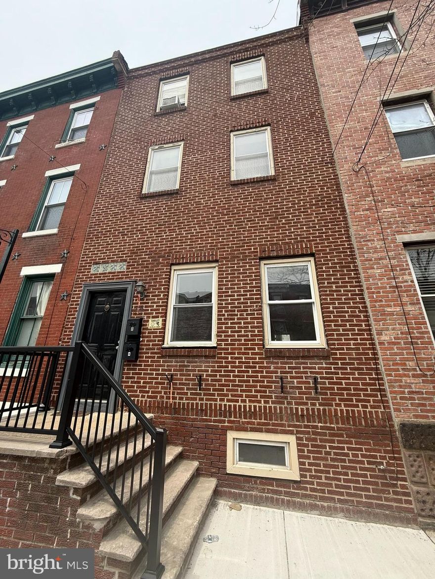 Welcome to 1525 Christian St Apt A! This is a move-in ready 2 bedroom 2 full bath home with PRIVATE DRIVEWAY PARKING available for rent in the sought after Graduate Hospital section of Philadelphia. This refreshed and well kept bi-level apartment style home offers a spacious living room with soaring ceilings, two large bedrooms with good closet space,  easy to use kitchen and access to inside from both the front and rear of the home. Enjoy use of the in unit washer/dryer on the main level and the unfinished basement can be great as a home gym or storage area. Natural light streams in through several windows throughout the home creating a bright and calming feeling. A brand new and efficient mini split heating and cooling system will keep you comfortable year round. There are also ceiling fans and electric baseboard heating to supplement the mini splits. The property is located within a short distance to coffee shops, great restaurants and all the local amenities one could need. Tenants will pay electric while the water is included in your monthly rent (there is no gas service in the home). Pets will be considered on a case by case basis. Don't delay, inquire today, your new rental home is just a few clicks away!