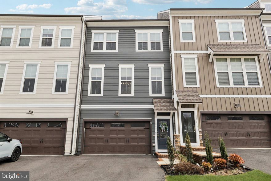 Welcome to modern luxury in the sought-after community of Potomac Shores. This stunning four-level townhouse, built in 2022, offers the perfect blend of contemporary design, thoughtful upgrades, and exceptional living space.

Featuring 4 spacious bedrooms and 4.5 beautifully updated bathrooms, this home is designed for both comfort and style. The kitchen showcases quartz countertops, stainless steel appliances, creating a polished and elegant kitchen that flows seamlessly into the dining and living spaces—ideal for everyday living or entertaining.  The living room features a custom feature wall that brings warmth and style to an already exceptional space. 

Each level provides flexible living areas, while the luxuriously updated bathrooms add a touch of sophistication throughout the home. The two-car garage includes an EV charger, offering convenience for modern living.

The true showstopper is the private rooftop patio, perfect for relaxing evenings, entertaining guests, or enjoying views of this vibrant waterfront community.

Located in the highly desirable Potomac Shores neighborhood, residents enjoy access to miles of trails, community amenities, and easy commuting options.

Nearly new construction, stylish upgrades, and a prime location—this home checks every box. Schedule your private showing today.