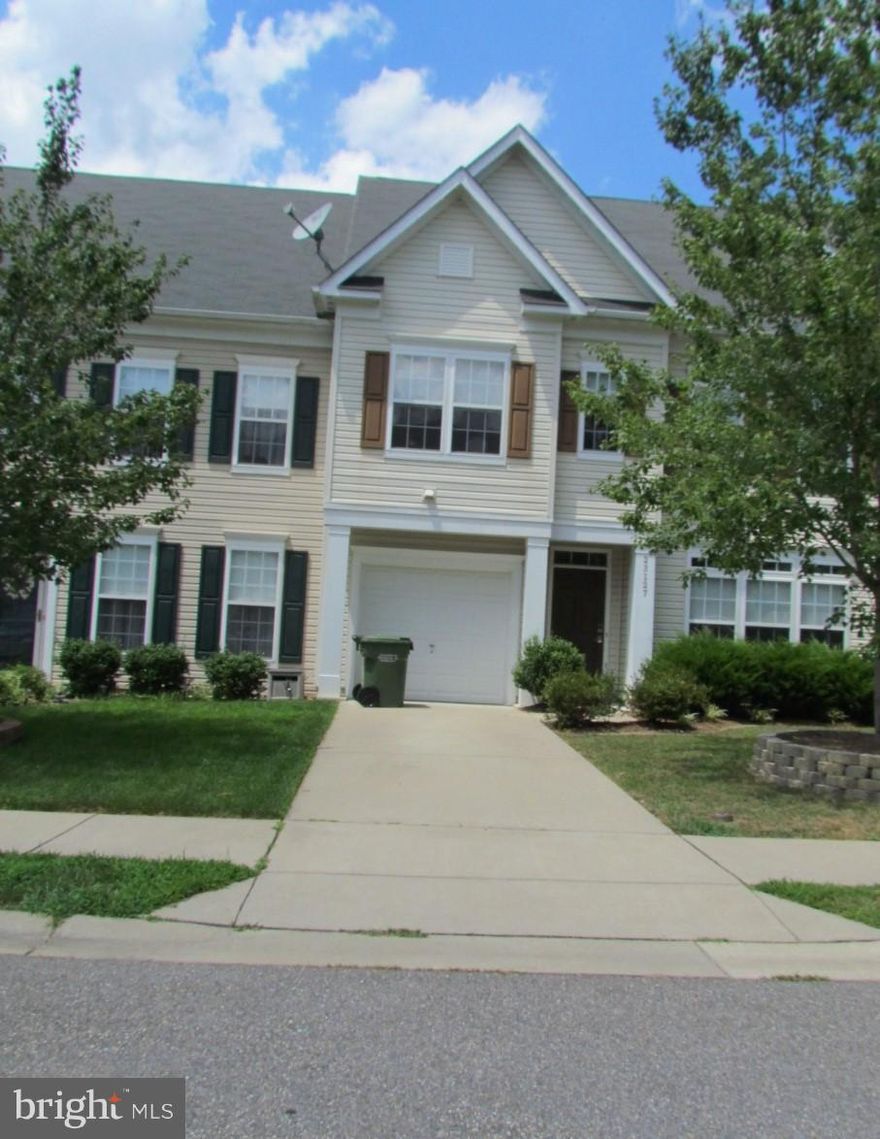 3 Bedroom 2 1/2 bath interior townhouse featuring eat-in kitchen with wood flooring, cherry cabinets separate dining room and living room. Upper level features Master Suite with two walk-in closets. Additional features include upstairs laundry room and attached 1 car garage.