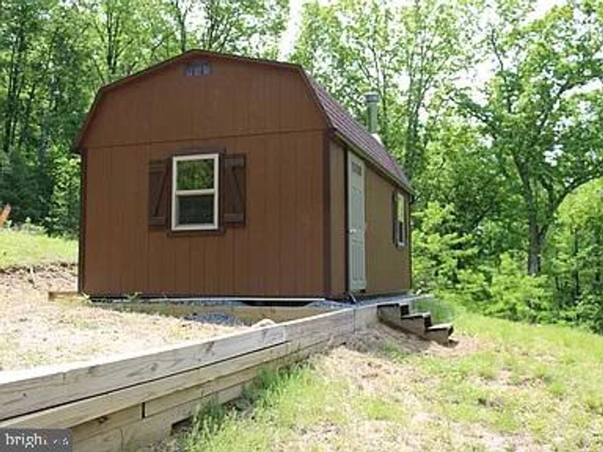 Great lot located in the Lost Valley Subdivision.  This 2.76 parcel offers seasonal mountain views and a PICTURESQUE setting where you can enjoy seeing wildlife pass through.  No hunting within the HOA, but Lost Valley is partially bordered by the Rapidan Wildlife Management, just a short distance away.  Nearby hiking at Shenandoah National Park, or even in your very own back yard!  This lot currently has a shed/cabin with a loft and wood burning fireplace.  The property survey was done in 2023 along with major soil improvement, land clearing, and leveling. In 2023, the property was approved for primary and 100% reserve for a 2BR. Well and septic permit was acquired in 2023. Come out and see what this lot has to offer!