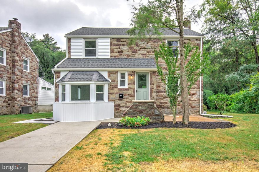 Welcome to 258 Lee Circle, a beautifully renovated 4-bedroom, 2.5-bath home in a quiet and sought-after Bryn Mawr neighborhood. Perfectly situated, this residence offers the convenience of being close to everything the Main Line has to offer—including shopping, dining, schools, and the local train station for commuters—while enjoying the peace of a residential setting. The home’s charming stone exterior sits on a flat, usable lot, offering both curb appeal and functionality. Inside, refinished hardwood floors highlight the home’s character, while the thoughtful floorplan provides great flow throughout. The brand-new kitchen is a showstopper with its large center island, white cabinetry, quartz counters, and stainless steel appliances. A first-floor powder room adds convenience, and a separate flexible room can serve as an office, den, playroom, or more. Upstairs, you’ll find four bright and spacious bedrooms, including a large primary suite with walk-in tiled shower and double vanity, as well as a second full bathroom with a tub/shower combination. Additional attic space and a large basement are clean and ready for practical storage. With timeless charm, modern updates, and an unbeatable location, this home is truly move-in ready and waiting for its next chapter.