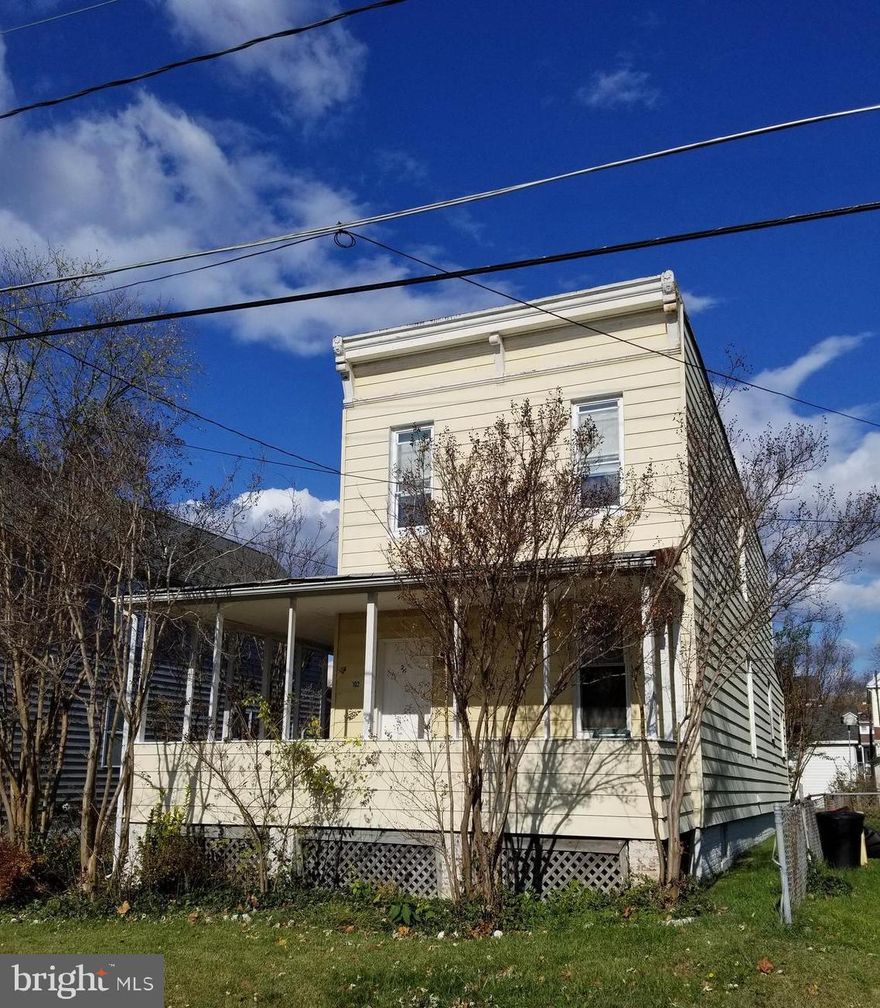 This 3  bedroom home is ready for you to reimagine and has oodles of possibilities.  Currently 3 bedrooms, 2 full and 1 half bath.  A wrap around porch, central air, cozy gas heat and a whole house generator are some of the great features.  The lot is larger than some, and has room for a driveway and a space to play in the backyard.  Cash or conventional loans only.