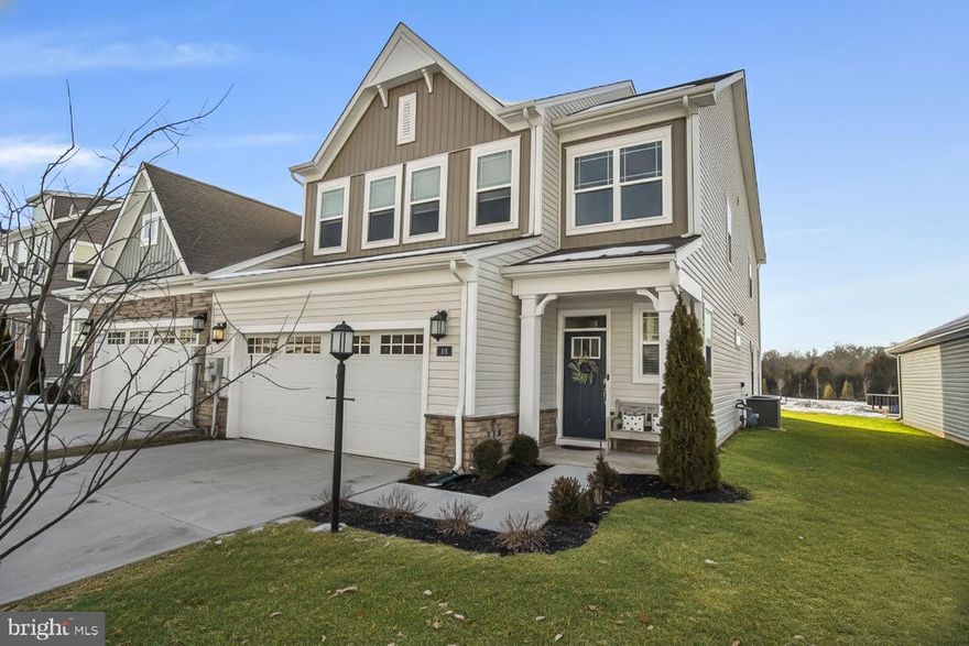 Welcome home to 80 Boneset Drive, located in Amblebrook Gettysburg. This beautifully maintained Lennar-built Laguna model offers 4 bedrooms and 3.5 bathrooms, with exceptional flexibility and comfort thanks to two primary suites, one on the main level and one upstairs. This layout is perfect for multigenerational living, guests, or giving you the freedom to choose your ideal primary retreat. This home is packed with desirable upgrades, including a whole-house water softener, an absolute must-have in the Amblebrook community, already installed for your convenience. Additional enhancements include pendant lighting in the kitchen, a custom tile backsplash, undercabinet lighting, updated cabinet hardware, and ceiling fans throughout. The open-concept kitchen and living area create a welcoming space for entertaining or everyday living. All appliances convey, and a transferable HVAC warranty adds extra peace of mind. Step through the rear slider and enjoy beautiful sunset views under the included 10’ umbrella, providing a peaceful backdrop to your evenings. The two-car garage offers ample storage, and the home is being offered with a quick close available. Amblebrook is a vibrant, resort-style community featuring a state-of-the-art clubhouse, fitness center, indoor and outdoor pools, pickleball and tennis courts, walking trails, and a full calendar of community events, making it one of the best places to live for active, low-maintenance living. Ideally located just minutes from historic downtown Gettysburg, with convenient access to Harrisburg, and approximately 15 minutes to the Maryland line, this home offers an easy commute to shopping, dining, medical facilities, and regional travel routes. Don’t miss this move-in-ready opportunity in one of Gettysburg’s premier communities, schedule your private tour today!