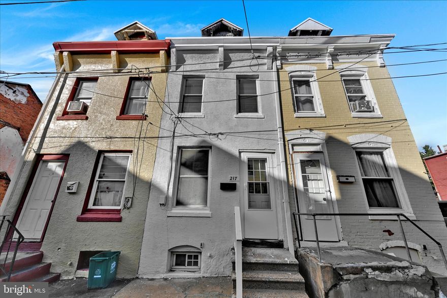 Fully refinished 4-bedroom city row home offering affordable and convenient in-town living. This home features new flooring, carpet, paint, and a fully updated bathroom. The kitchen includes brand new stainless steel appliances, and the new gas furnace and water heater provide peace of mind. One of the few homes on the block with rear parking, this property is move-in ready and a great option for a first-time buyer or investor.