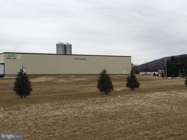 Great investment and/or opportunity for end user who wants to secure a great location with additional development potential and a great rate of return. Includes 26 acres of industrial land with two 24,000 sq. ft. buildings with high electrical capacity. Five year lease at $399,120.00 per year, triple net. Value added opportunity to build approximately 156,000 sq. ft. of additional building space.
