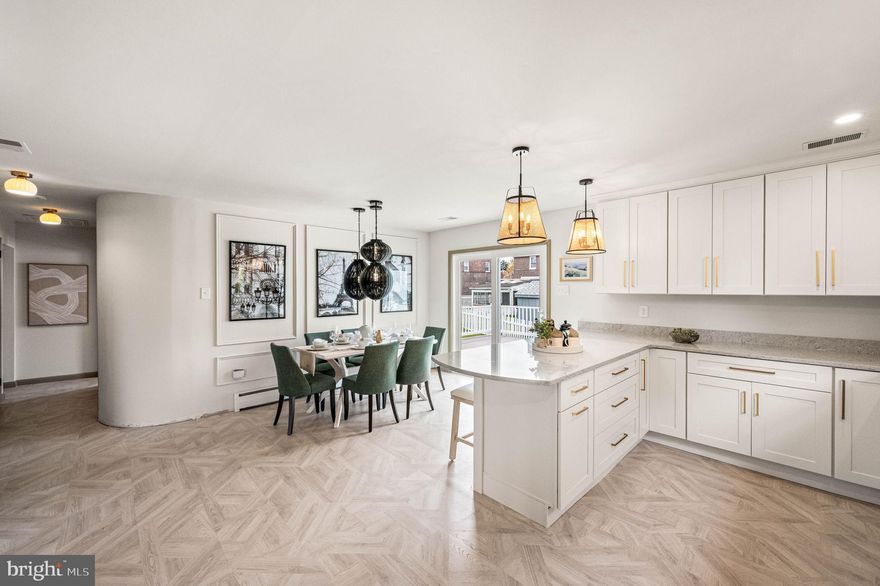 Nestled in the heart of sought-after Haverford School District, this exquisite home reinvention by Arters Collective beckons with its timeless charm and modern allure. A convenient and desirable one-floor living layout welcomes you through a charming front porch into a light-filled space boasting architectural accents such as archways, rounded walls, elegant trim and designer light oak waterproof laminate in a parquet pattern. The sun-drenched interiors reveal an open concept floor plan where every detail has been thoughtfully curated. The spacious family room offers a comfortable space to gather while the dining room is bathed in natural light from sliders leading to a large deck overlooking the yard. Culinary delights await in the kitchen adorned with shaker cabinetry with champagne hardware, quartz countertops with oversized under mount sink and stainless steel appliances. A full basement promises versatility with a recreation room featuring a cozy fireplace, finished flex space ideal for office or workout area, and a convenient powder room for guests' comfort. Retreat to the primary bedroom suite offering luxurious amenities like a walk-in ceramic tile shower, double vanity and a walk-in closet. Outside boasts more than just beauty; an oversized deck for summer barbecues and a two-car detached garage accessed via private driveway ensures ample parking. This idyllic haven with new central air is perfectly situated for easy access to Philadelphia's vibrant energy yet offers respite from city life within minutes of Main Line shopping districts and major routes like Rte 3, Professionl Photos will be uploaded on Wednesday.