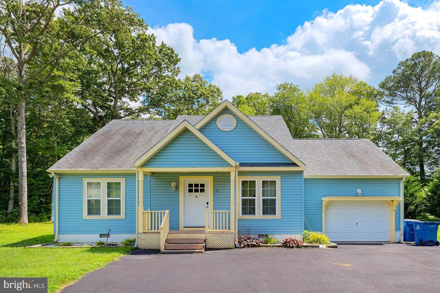 Welcome to Ocean Pines! Step through the front door into a welcoming living room featuring a cozy fireplace, soaring vaulted ceiling with fan, and a skylight that fills the space with natural light. The open layout flows effortlessly into the dining area, highlighted by a specialty light fixture, and the modern kitchen, which boasts designer pendant lighting over a breakfast counter that seats two, stainless steel appliances, and crisp white cabinetry. Sliding glass doors off both the kitchen and living room lead to a private deck—perfect for outdoor dining or relaxing. The main-level primary suite offers a vaulted ceiling with a fan, a spacious walk-in closet, and an ensuite bathroom complete with a step-in shower and built-in cubby storage. Upstairs, you’ll find two additional bedrooms and a shared full bathroom, ideal for family or guests.

Located in the amenity-rich Ocean Pines community, residents enjoy access to five pools, pickleball and tennis courts, a dog park, playground, and optional golf course membership—perfect for active lifestyles and coastal living.