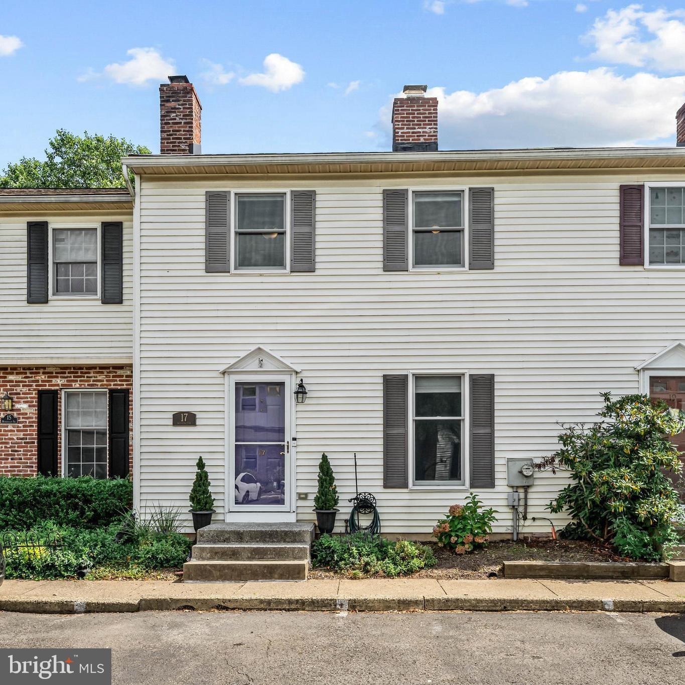Welcome to this beautifully maintained 3-bedroom, 2.5-bath townhome in the sought-after community of Olde Colonial Greene, located in picturesque Doylestown Township with the award-winning Central Bucks School District.
Step inside to find rich hardwood floors flowing throughout the sun-filled main level. A cozy brick fireplace serves as the stunning focal point of the spacious living room, setting the perfect tone for relaxing evenings. The eat-in kitchen features classic white cabinetry, granite countertops, a newer stainless steel refrigerator, and a large double-door pantry. Sliding glass doors open to a private, fully fenced rear yard and patio—ideal for entertaining or unwinding outdoors. The kitchen seamlessly flows into a formal dining room, currently used as a playroom, offering flexible space to suit your needs. A stylishly updated powder room completes the first floor.
Upstairs, you'll find a primary suite with a double closet and en-suite bath, plus two additional generously sized bedrooms and a full hall bath. The convenient second-floor laundry and linen closet add ease to your daily routine. The full basement has been professionally waterproofed and includes a newly installed sump pump with a water power back up for added peace of mind. Additional upgrades include a new roof installed in 2020 with lifetime warranty shingles.
The neighborhood offers amenities including a kids' playground and basketball courts, and access to the party room. Just outside the community, a newly installed walking path connects to Central Park and the Route 202 Trail, along with easy walking access to Doyle Elementary, Lenape Middle School, and Delaware Valley University. Don’t miss your chance to own this move-in ready home with easy access to major commuter routes and just minutes from downtown Doylestown Borough with shopping, dining, and so much more.