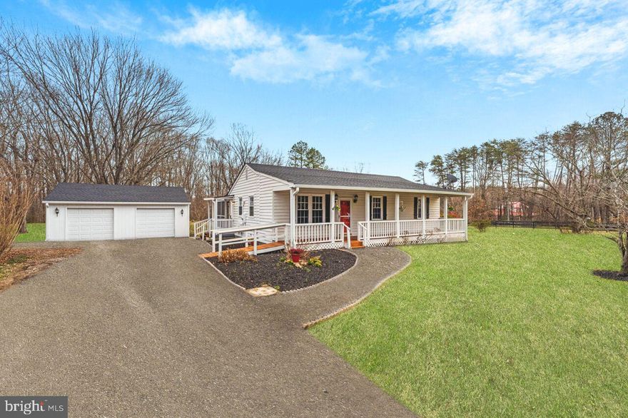 Nestled on a picturesque 3-acre lot, this charming one-level home offers a spacious layout with 3 bedrooms, 2 baths, and a large 2-car detached garage. Recently renovated and boasting a newly installed roof & 6-inch gutters this property features a large screened-in back porch for enjoying the serene surroundings and a welcoming front porch ideal for relaxation. This home also comes equipped with a Generac Generator. High speed internet available with Firefly!