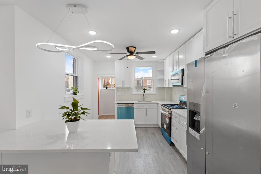 Welcome to this beautifully renovated 4-bedroom, 2-bathroom home in the heart of Philadelphia’s 19138 zip code. This modern gem features an open-concept layout with luxury vinyl flooring throughout, offering both style and durability. The brand-new electrical system ensures peace of mind, while the gorgeous front lawn enhances curb appeal. Enjoy the convenience of a rear driveway for private parking, making city living effortless. With spacious bedrooms and modern finishes, this home is perfect for a first-time homebuyer or investors looking for a move-in-ready property. Don't miss out—schedule your showing today!