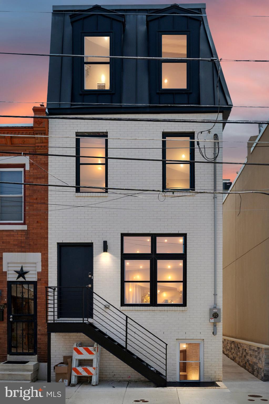 Welcome to 3077 A Salmon St, a beautiful new construction townhouse in the heart of Port Richmond, one of Philadelphia's fastest growing neighborhoods. This 2,200 square foot single-family home seamlessly combines modern elegance with functional design, offering an inviting space perfect for both relaxation and entertaining.
Step inside to discover a thoughtfully designed, open floor plan living space with very high ceilings and recessed lighting throughout. The spacious open-concept leads you to a chef's kitchen, complete with Energy Star appliances, stainless steel finishes, and luxurious quartz countertops. Enjoy preparing meals with the high-end electric oven and stove, while the breakfast bar provides a casual dining option. The sliding glass doors at the back of the kitchen enhances the space with tons of natural light which open up onto your first of 3 private outdoor spaces.
The home features three generous bedrooms and two beautifully designed bathrooms. There is a primary suite with an ensuite bathroom on the 3rd floor that includes dual walk in closets, plus a private balcony. The second floor has 2 bedrooms, one full bathroom, and a dedicated laundry room.
For those who enjoy even more private outdoor space, this house offers a private rooftop deck with 360 degree views, including views of center city. Comfort is ensured year-round with two separate HVAC systems, one for the lower levels and one for the upper levels.
A full unfinished basement with 9 foot ceilings is ready to be finished should you decide you need even more finished space.
This home offers a 10 year tax abatement.
Don't miss the opportunity to make this exquisite property your own.