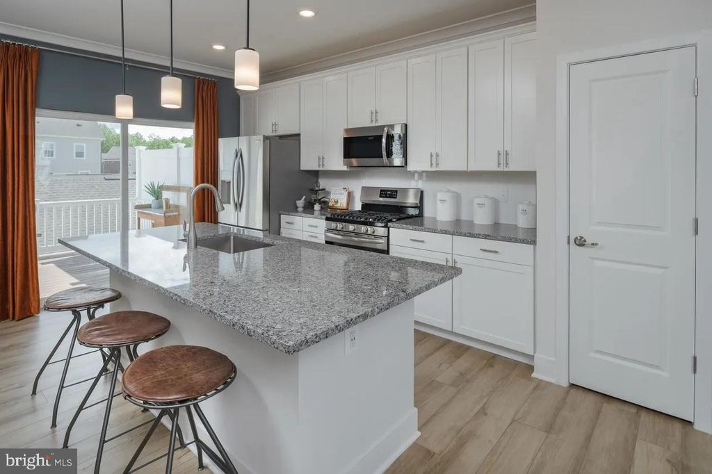 Photo of 10701 Millport St, WHITE PLAINS, MD 20695 (MLS # MDCH2048146)