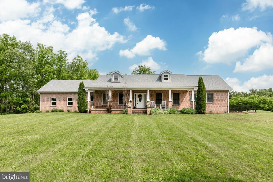 Sprawling rancher, 10  years young, on 16.25 acres.  Wood floors flow throughout this home with a convenient mud room, laundry and powder room on main level at garage entrance.  Large kitchen loaded with cabinets has space for a small table.  Separate dining and living room.  Step out onto your covered & screened rear deck to watch the wildlife.  Some woods, a stream and open space for your animals, fencing and barns.  Full unfinished basement awaits your storage needs, more space for rooms w/ walk up to side of home.  Efficient and affordable Geothermal HVAC.  3 generous sized bedrooms with 2 full and 1 half baths.  If you've been looking for that room w/ a view - you'll have it from each window in this home.  Very private and serene setting w/ older ATV trails.  Price improved and ready for our summer buyer.   So much potential here if you want animals, gardens etc. This property is outdoorable!