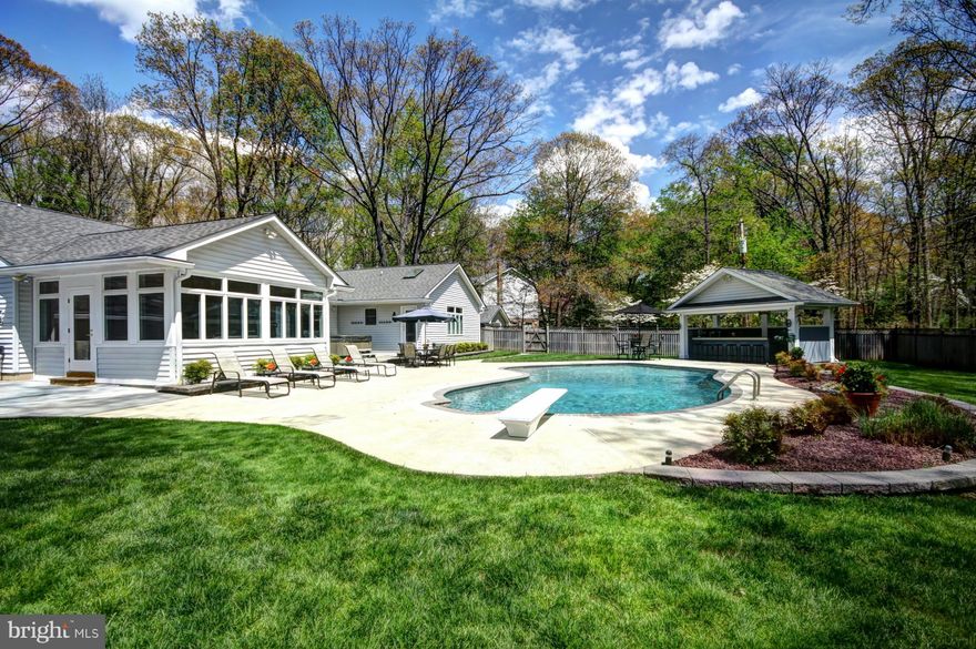 Immaculate home situated on a 1 acre lot in the center of Chartwood.  This main level living home has been updated and includes new baths, rear addition, sun-room, hardwood flooring, walk in closet, and finished basement with bar.  The yard and pool area are an outdoor oasis for entertaining.  Enjoy private living in a wonderful community within the coveted Severna Park School district.