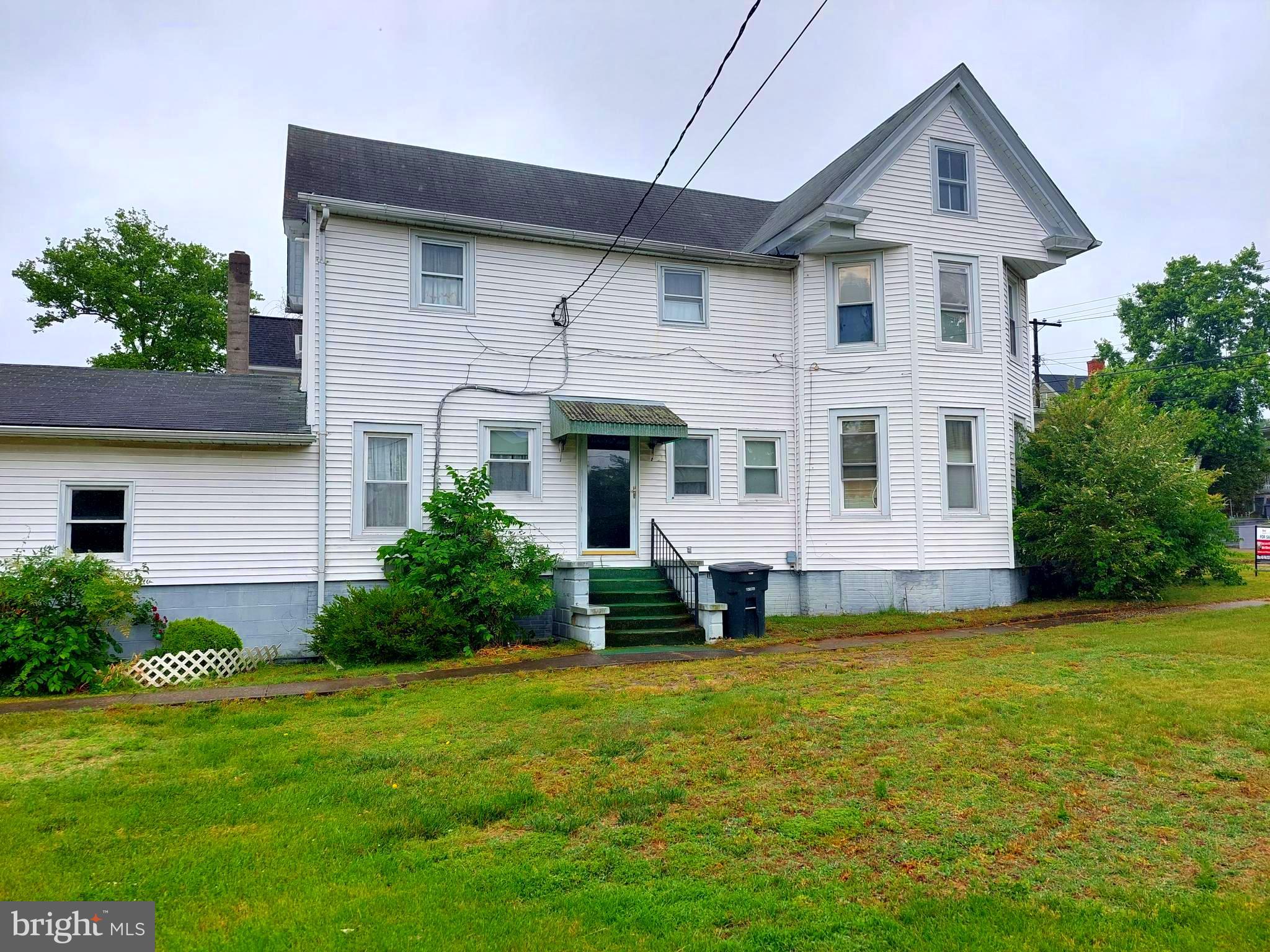 This home is selling as is. It has been very well maintained. The seller is in the process of having all items removed from the home. All appliances stay with the home. The lot adjacent is included in the price. Very large rooms and garage. With some interior updating this will become a beautiful and comfortable home to call home. Won't last long.