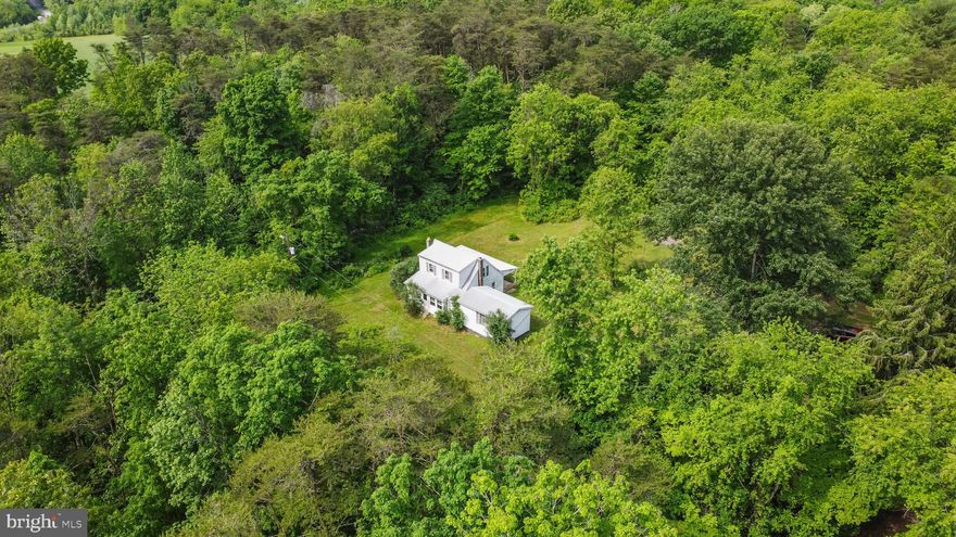 GREAT WEEKEND GETAWAY ON 12 ACRES+- THAT IS MOSTLY WOODED. JUST HALF A MILE FROM LICKING CREEK FOR FISHING.  IDEAL FOR A HUNTING CAMP OR JUST A PLACE TO GET AWAY FROM ALL THE HUSTLE & BUSTLE & ENJOY THE QUIET.  A GREAT PLACE FOR EXPLORING & RIDING 4 WHEELERS. THE HOME CONSISTS OF TWO-THREE BEDROOMS, KITCHEN, LIVING ROOM WITH A WOOD STOVE & FULL BATHROOM. THE LOT IS MOSTLY WOODED & LEVEL. A LARGE SHED FOR STORING ATV'S & MORE. THE PROPERTY IS A SHORT DRIVE TO THE C&O CANAL, POTOMAC RIVER & WESTERN MD BIKE PATH. APPROXIMATELY ONE HOUR AND FIFTEEN MINUTES FROM WASHINGTON DC & BALTIMORE MD. PROPERTY IS BEING SOLD AS-IS AND IS FURNISHED WITH APLIANCES. NOTHING TO DO BUT MOVE IN AND RELAX. THE PROPERTY COULD CERTAINLY BE USED AS AS FULL TIME RESIDENSE.