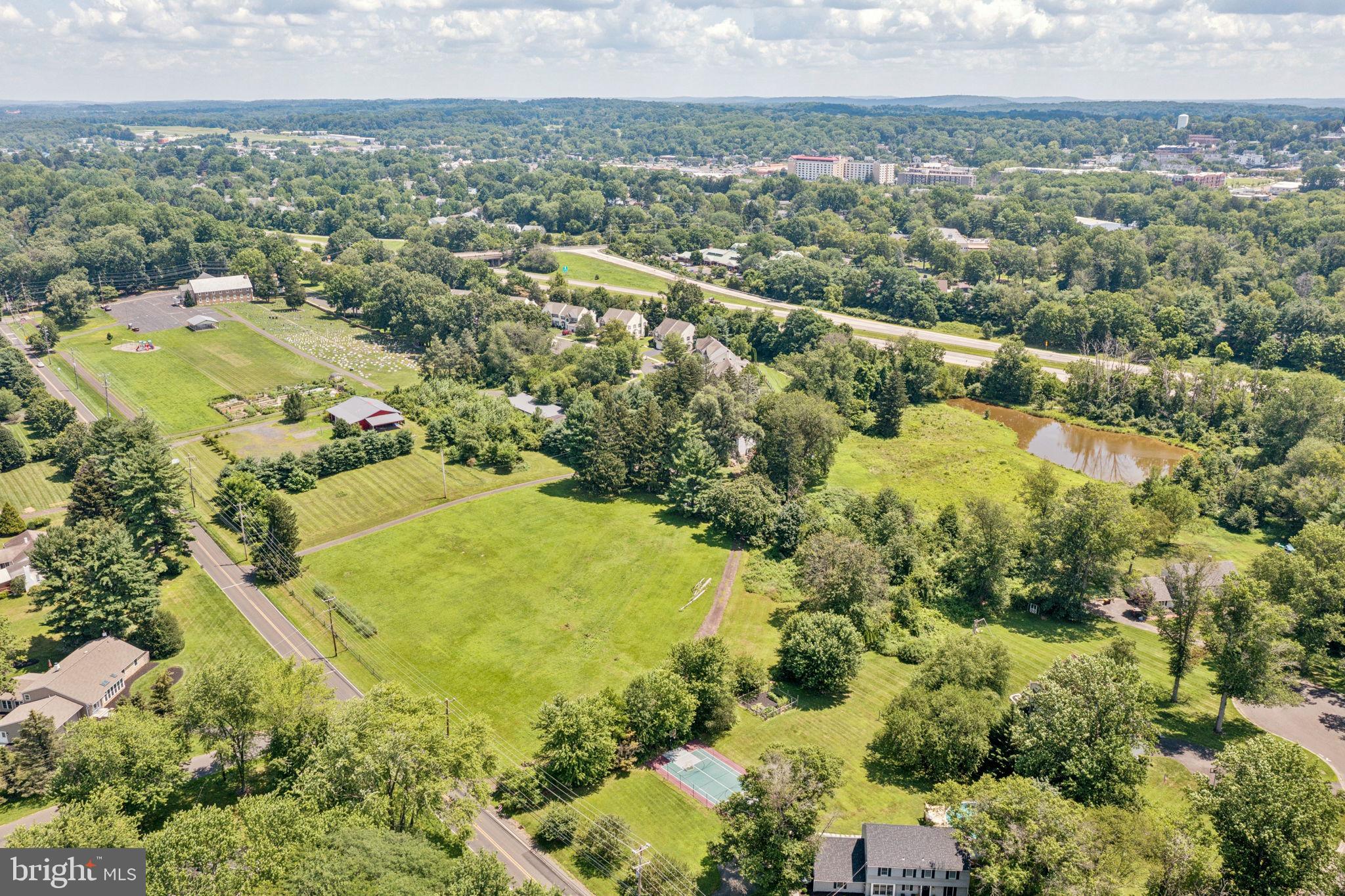 Welcome to 925 Sandy Ridge Road, 10.106 gross acres of land in the heart of Doylestown Township ready for a developer to create something special. Currently zoned R1 with possibility of subdivision for up to 8 lots, this property contains gorgeous buildable land and a pond in the rear of the lot for a future community to enjoy. Less than a five minute drive to the heart of the borough and situated in Central Bucks School District, the location makes for the perfect opportunity for building Homes that will be desirable to every family in Bucks County. Land currently holds a 3 bedroom farmhouse and two smaller outbuildings. Preliminary sketch plans available for interested parties, reach out to listing agent for details.