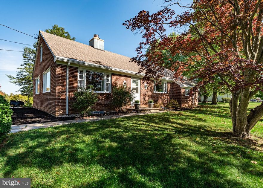 Huge price reduction!!! Rare chance to own charming mid century home with over two acres of open land in the Hollifield Station area of Ellicott City! Classic all brick Cape Cod with tons of original appeal! This home has been well maintained and systems updated through the years, yet the classic layout and finishes have been largely preserved.  Refinished solid oak floors throughout main level and entire house have been freshly painted. The living room is spacious and perfect for entertaining friends or for just enjoying a cosy fire in the gorgeous stone mantle fireplace. The dining room has beautiful built in display cabinets, and both dining and living room overlooks the enormous back yard! The large kitchen has maintained a fantastic mid century style including stainless steel counters, yet the kitchen appliances are newly updated to support a modern lifestyle. The loft with dormers overlooking the back yard is perfect for an office or play area. Finished lower level has walk-out access.  Newer roof and HVAC system! Public water and sewer makes adding on easy. The 2+ acre lot provides endless possibilities. This is the perfect get-away from the city where you can adapt a sustainable lifestyle and grow your own produce, plant fruit and nut trees/bushes, raise chickens, play a game of soccer or just enjoy the view!  This house is solid brick construction - you don't see homes built like this anymore - no stick built here! Howard County Schools! Both Hollifield Station ES and Patapsco MS are both only 1/2 mile away, and Mt Hebron HS is less than 2 miles away! The lot does not have any encumbrances, and the two acre lot size is truly unusual for this area.   Almost new lawn tractor conveys! Enjoy a country feel, yet be only 10 min from historic Ellicott City, and 20 min from Baltimore Inner Harbor or BWI airport. CAT-5 high speed optical network to support working from home so there is more time to go hiking in the beautiful Patapsco Valley State Park that is less than a mile away!