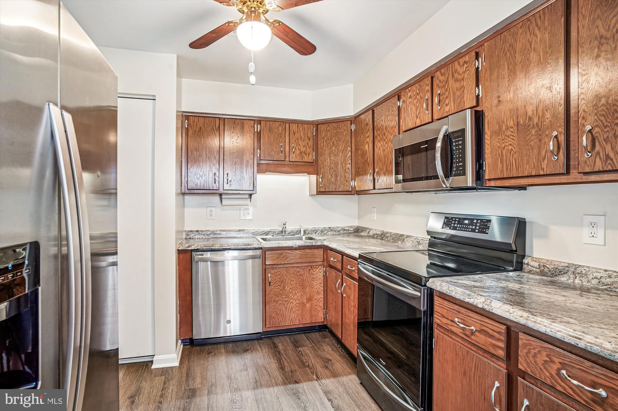 Welcome home to this beautifully renovated three-bedroom, one-and-a-half-bathroom condo, conveniently located on the second floor. As you step inside, you'll be greeted by a bright and airy open-concept layout that seamlessly connects the living, dining, and kitchen areas, creating the perfect space for entertaining and modern living.
This turnkey property has been completely updated, meaning you can move right in without any work needed. The three spacious bedrooms offer flexibility for a home office, guest room, or family. Enjoy the ultimate convenience with vibrant retail shopping and a diverse selection of restaurants just a short walk from your front door. This unit also offers peace of mind with secure building access and ample, hassle-free parking for you and your guests. Don't miss this opportunity to own a stylish, low-maintenance home in an unbeatable location. Schedule your private tour today!