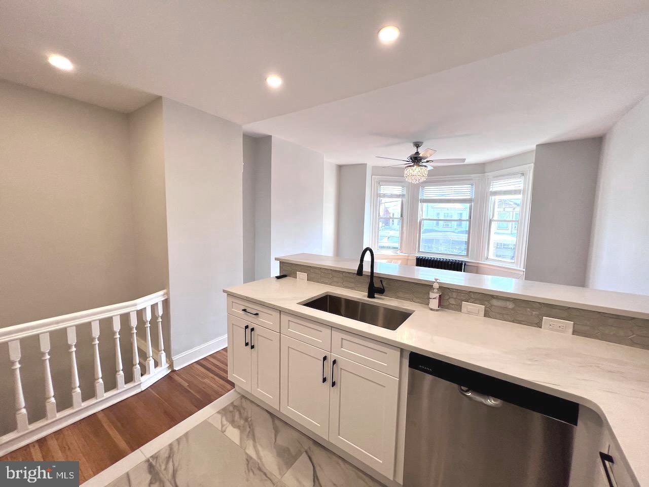 UPDATE: New pictures of RENOVATED first floor apartment are uploaded! MOTIVATED SELLER Well-maintained and updated duplex in Cobbs Creek offers an incredible opportunity! Whether a seasoned investor or your first investment, you could live in one unit while the other pays your mortgage. With both units having recent updates, they're ready for an upscale city professional tenant. You could even rent out the garage or extra storage on the lowest level. The possibilities are endless!
Unit A (Lower) is a very spacious 1-bed, 1-bath apartment boasting a large living room, formal dining room perfect for gatherings, and a sunlit kitchen with a refrigerator and electric range. This apartment enjoys a roomy private backyard outdoor retreat. A full laundry for this unit is in the basement with washer and dryer in place. This unit looks brand new with the very recent updates, fresh paint throughout, refinished hardwoods in the living room, new laminate wood flooring in the bedroom and hallway, updated lighting with ceiling fans, freshly painted kitchen cabinets, bathroom updates and more. We anticipate the lower unit rent to be at $1,200/month with these updates. Come and see for yourself! Thinking about major renovations? Open up the floor plan and completely transform the layout by taking out the wall between the dining room and kitchen!
Unit B (upper) provides city living at it's best with a true showpiece, completely renovated apartment. The new kitchen is a dream with the perfect arrangement to entertain and create the gourmet experience. Starting with granite countertops, 42 inch cabinets, marble floors, breakfast bar, recessed lighting, deep sink and stylish backsplash. Then there are the new stainless appliances including a large Frigidaire side by side fridge with lower freezer drawer, ceramic cooktop range with warming drawer and space saver microwave. The breakfast bar will easily host 4-5 guests while the adjacent room with a bay window would make a great living room or combo dining room if you'd like. The open-concept layout allows natural light from the bay window to brighten the entire space. The space is breathtaking and to top it off the crystal chandelier with the ceiling fan really makes it pop!
Head down the hall where the newly refinished 1.5 inch white oak hardwood really gleams under all the recessed LED lighting. The convenient laundry nook homes brand-new stacked Samsung washer and dryer. The new bathroom with high-end finishes including new vanity, LED lighting, and brushed black fixtures. This level is completed by two very generously sized bedrooms, both with lighted ceiling fans, beautiful floors, good closets and modern electrical service
This 2-bedroom, 1-bathroom apartment has a rental potential of $1,450/mo. Additional features: 2020 roof replacement, 24-hour exterior surveillance with a free app, separate electric and hot water heaters (Unit B 2024), new sewer mains and new electrical wiring. There is separate garage door access to the expansive unfinished basement space offering endless possibilities for storage, a workshop, or a small business.
Located just minutes from subway stations, bus stops, and within 5 miles of Center City and 10 miles from Philadelphia Airport, this property offers convenient access to everything you need. Don’t miss the chance to own a versatile property in a prime location – perfect for living while generating income or expanding your portfolio! Bring us an offer!