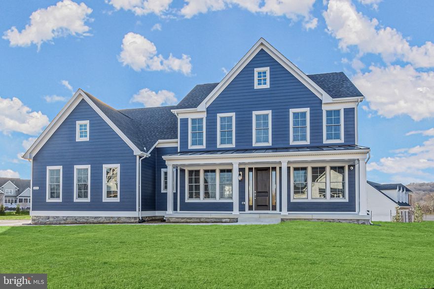 Discover the epitome of modern living with the Ryleigh, a stunning to be built new construction home by Catonsville Homes. Situated on a sprawling 7.18-acre homesite in the prestigious The Ridge at Falling Green Community in Mount Airy, this residence offers an unparalleled blend of luxury and natural beauty. As you approach the home, you'll be captivated by the charming stone to grade front, complemented by upgraded vinyl siding, and a 3-car side load garage, creating a striking first impression. Step inside to experience the seamless flow of the open floor plan, where the main level boasts a gourmet kitchen and butler's pantry adorned with upscale countertops and a convenient walk-in pantry. The kitchen's breakfast bar effortlessly transitions into the sunlit morning room, leading to a spacious family room featuring a cozy gas fireplace - the perfect setting for relaxation and entertainment. Additionally, the entrance from the garage welcomes you with a thoughtfully designed mudroom complete with built-in cubbies, alongside a well-appointed powder room.
 Ascending to the second level, you'll find 4 bedrooms and 4 bathrooms, including a luxurious primary bedroom suite showcasing a generously sized walk-in closet and an opulent primary bath with an oversized shower. The second level also offers the convenience of a walk-in laundry room, enhancing everyday ease and functionality. The potential for customization awaits in the unfinished lower level, providing a blank canvas for designing your dream space, with the added bonus of a walkout sliding glass door exit, seamlessly merging indoor and outdoor living. Don't miss the opportunity to make this new home your own and experience the unparalleled lifestyle it offers.