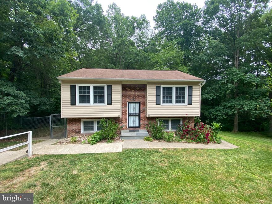 4 bedroom, 3 bath home located in a cul-de-sac in The Timbers in Spotsylvania, VA. Kitchen with table space, separate living room area.  Rear deck overlooking fenced yard with babbling brook running through land behind fence.   Pets case by case, under 25LBS with deposit.  Lawn care, trash & recycling included in rent.  Professionally cleaned & ready for move in.  Minutes from 95, VRE, shopping & much more!