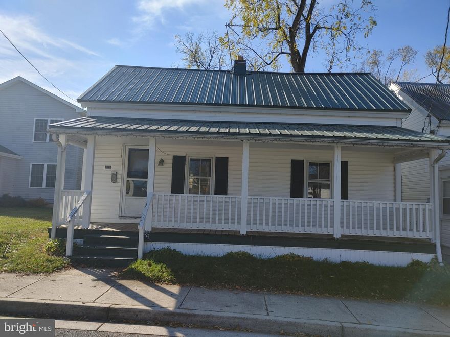 COTTAGE with potential for expansion on upper level.  Being sold AS-IS.  home is livable but Definity could use a face lift.    ALL fees paid for water and sewer hook up etc.  vacant.