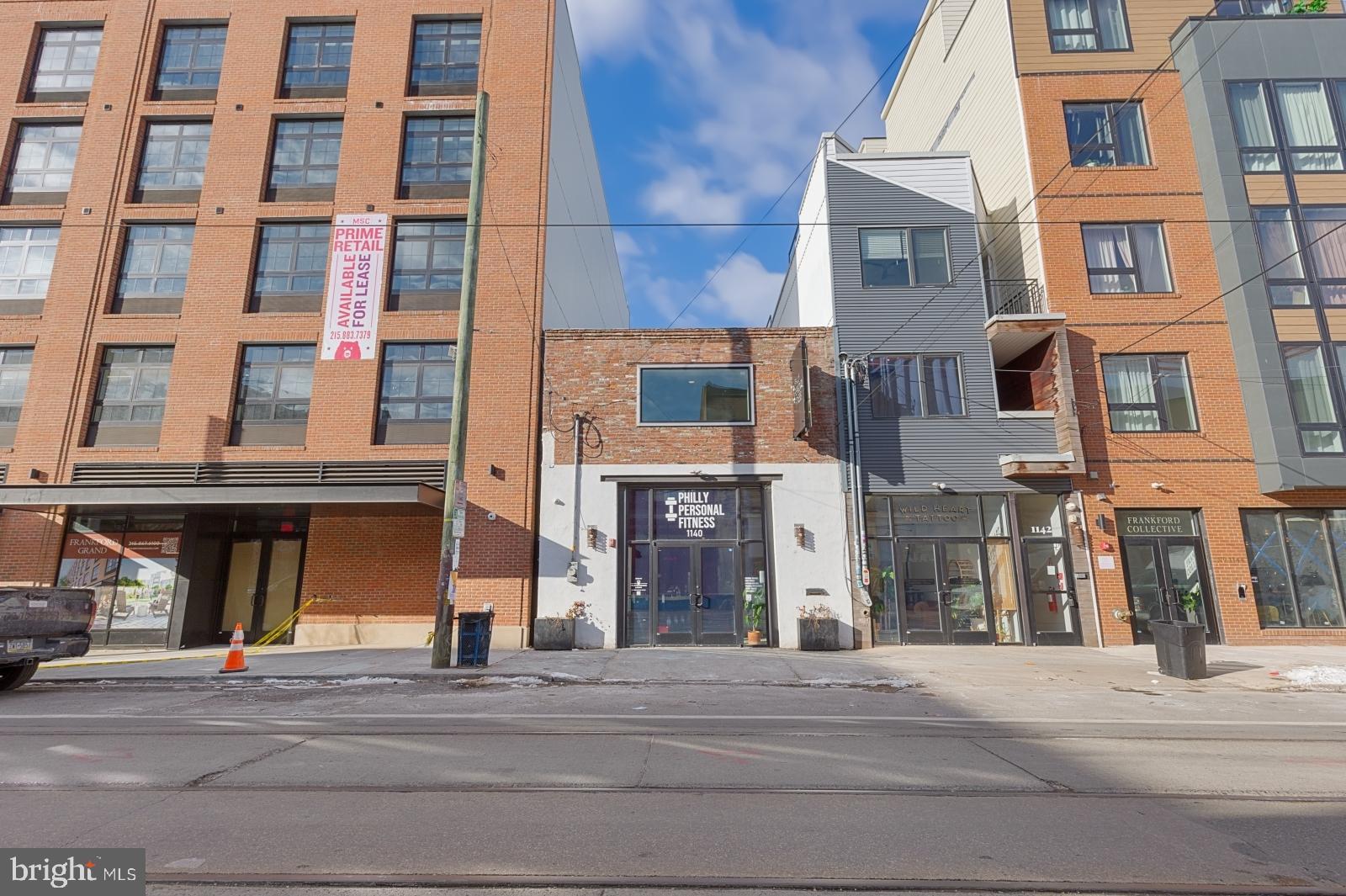 Available April 2026:
This 2,500 square foot commercial property at 1140 Frankford Ave in Fishtown offers a unique opportunity for your business. The first floor features a spacious, straight-through layout with two half baths conveniently located at the back. Enjoy exposed spiral ductwork, recessed lighting, high ceilings, and an accent wall. It also includes access to a private patio, perfect for outdoor activities or additional functionality. The second floor is equally versatile, with an open layout and a striking glass-enclosed room overlooking the entryway, providing a modern and stylish touch. A rooftop deck provides breathtaking views. The property is equipped with ductless mini-split a/c systems and is fully customizable to suit your specific needs. Located in the heart of Fishtown, this space is surrounded by local parks, restaurants, and entertainment, all within a highly walkable area. Its prime location also offers easy access to major highways, making it an excellent choice for a variety of business types.
Lease Terms:
A physical tour is required before applying. Sight unseen applications will not be considered. Generally, 1st month, 12th month, and 1 month security deposit due at, or prior to, lease signing. Other terms may be required by Landlord. $55 application fee per applicant. Tenants responsible for: all utilities + NNN lease. CMX-2.5 Zoning.