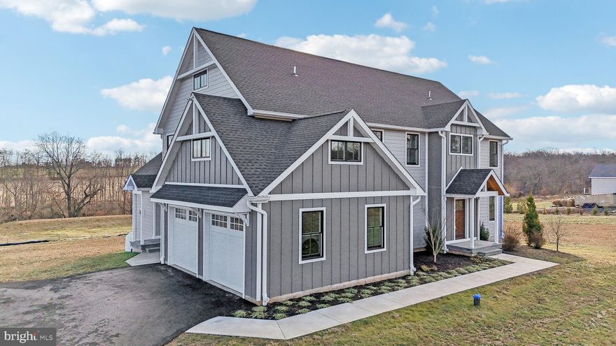 NEW CONSTRUCTION!    Welcome to this exceptional custom-built Farmhouse, situated on a picturesque 3-acre lot backing to preserved farmland in the highly desirable Central Bucks School District. Located just 1.5 miles from Peace Valley Nature Center. With a thoughtfully planned layout and an abundance of natural light, this home is perfect for both entertaining and comfortable living. Step inside to discover a grand foyer featuring stunning herringbone pattern flooring, 9FT ceilings, and an elegant staircase. To the right, a formal living area flows into a private office with double doors, creating a perfect work-from-home space. To the left, a formal dining room awaits, ideal for hosting memorable gatherings with 2 closets. At the heart of the home, you’ll find a gourmet kitchen with a spacious island for seating, a propane range with a striking hood, a convenient pot filler, and plenty of cabinet space. The cozy morning room and inviting family room, featuring vaulted ceilings and a propane fireplace, provide additional areas to relax and enjoy overlooking your private level backyard. Every room in the home is outfitted with high hat lighting, paired with a thoughtfully curated selection of stunning light fixtures that enhance the ambiance and design.

Conveniently located off the 2-car oversized garage are a mudroom, which could easily accommodate an additional washer and dryer if needed, and a powder room for easy access. The second floor boasts a luxurious primary suite with an expansive walk-in closet, dressing area, and spa-like bath featuring a soaking tub and a large traditional shower. Three additional bedrooms, each with private access to a full bathroom, provide plenty of space for family or guests, and the laundry room is also located on this level for convenience. With plenty of closet space throughout the home, storage will never be an issue. The daylight basement, complete with a large window, provides an abundance of space for storage or the opportunity to create a custom finished area.  As long as they are not kept for farming purposes, this property provides a unique opportunity for animal lovers to enjoy keeping a horse or goat as a pet, with zoning regulations requiring the housing structure to be 100 feet from property lines or the street.

This stunning home, ready for immediate move-in, also offers ample opportunity to add your own finishing touches and personalize the space to truly make it your own. Combining modern amenities, timeless design, and a tranquil setting, all within an award-winning school district, this is a one-of-a-kind property you won’t want to miss! Please view video and 3D imaging.  Property has been staged with furnishings. Move-in ready!