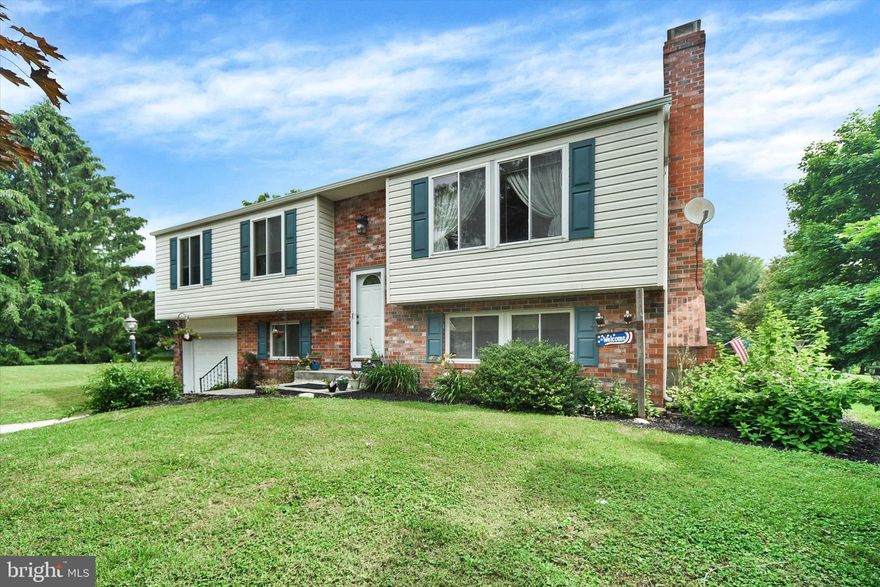 Welcome to this beautiful home for sale in the much desired Hereford Zone! This spacious property offers a serene and private setting with 2.29 acres of land. Built in 1978, this charming home boasts 1,885 square feet of living space and features 4 bedrooms and 3 full bathrooms.

Situated on a picturesque lot, the property backs up to tranquil woods, providing a peaceful atmosphere and ensuring privacy. The front and back yards are flat, offering plenty of space for outdoor activities and gardening. Additionally, an above ground pool with a 360 degree, wrap-around deck provides a refreshing oasis for those warm summer days.

One of the highlights of this home is the second-story deck, which not only provides a lovely view of the surrounding nature but also offers convenient access to the back yard via stairs. Whether you're hosting a gathering or simply enjoying a quiet evening outdoors, this deck is the perfect spot.

The upstairs bathroom has been recently renovated, showcasing modern fixtures and finishes. It's a tasteful space that combines functionality and style. The home also features a wood-burning fireplace, perfect for cozy evenings during the colder months.

As you explore the interior, you'll appreciate the hardwood floors throughout the upper floor, adding warmth and character to the living spaces. Downstairs, new luxury vinyl plank flooring provides a durable and stylish option for the lower level.

This home follows a split foyer design, providing a unique layout that maximizes space and allows for efficient flow between the different areas. The layout offers flexibility and separates the living and entertaining spaces from the private bedrooms.

Located in Parkton, this property falls within the highly desirable Hereford Zone school district, ensuring excellent educational opportunities for children in the area. With its serene setting, spacious living areas, and recent updates, this home presents a fantastic opportunity for those seeking a comfortable and inviting place to call their own.