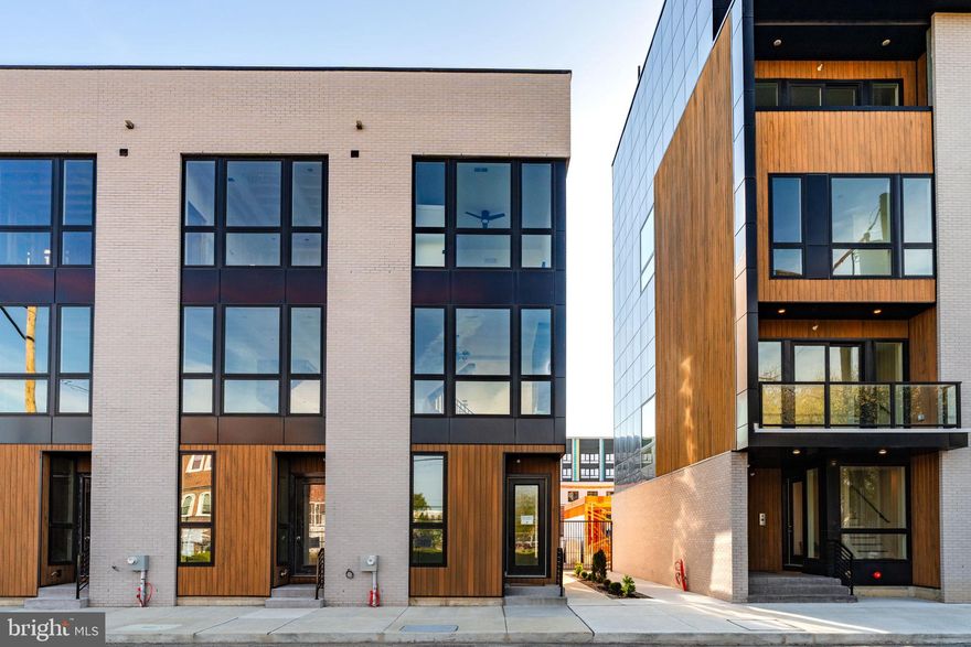 Discover modern city living in Somerset Square, a vibrant new community featuring 23 townhomes and 52 stacked duplexes, perfectly situated just two blocks from Fishtown and two blocks to Aramingo Ave. With rapid development transforming the area, now is the time to invest in this thriving neighborhood. Buyers have options for finishes and upgrades to customize to their tastes. This exquisite home is designed for modern living, featuring a private rear-loading garage, a flexible first-floor bedroom or home office with a full hall bath, upstairs is your main living area with a chef’s kitchen completed with quartz countertops, stainless steel appliances, and a large island for entertaining, a spacious living and dining area, and a rear deck off the kitchen. The third floor includes a generous sized guest bedroom & full bath. The primary suite has a luxurious en-suite bath with double floating vanity, standing shower, LED mirror and ample closet space. Finally, enjoy the beautiful sunsets from your private roof deck with maintenace free Trex decking. Additional features include Nest thermoset, Quickset Wifi Touch entry keypad,  video Intercom system, plus extra storage in the basement. Low HOA fees cover snow removal & landscaping, 10 year tax abatement and 1 year builders warranty.