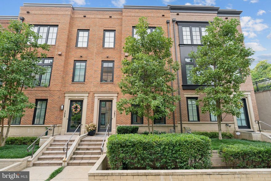 Stunning, modern EYA Brownstone @ Chevy Chase Lake offers the perfect blend of luxury, comfort, and convenience.  With approx 3363 sf, this curated private residence boasts 4 finished levels, 4 spacious bedrooms, 3 full baths, 2 half baths, rooftop terraza, & elevator.  Other features incl: an amazing chef's kitchen w/ upscale SS appliances (Bosch/Thermador), sleek antarctic cabinetry, and huge island.  The natural light accentuates the open space, high ceilings, floor-to-ceiling windows, & ash-coffee hardwoods throughout.  Next door, the dining area/great room is accompanied by a gas fireplace, perfect for the late Fall & Winter seasons ahead.  The interior's contemporary design is complimented by the Foscarini Caboshe ceiling pendant, remote motorized roman shades/curtains & sonos speakers.  MBR & 2 generous-sized bedrooms on the 3rd level w/ front load washer/dryer.  The 4th level has the fourth bedroom, full bath, and family/recreational space for movies & entertainment.  Step outside to the rooftop terraza and enjoy the wet bar, gas fireplace, and built-in Sedona grill year-round.  All levels are easily accessible by stairway or lift (elevator) tailored for passengers, groceries or material transport.  This home is in pristine condition and presents a wonderful opportunity to own in coveted Chevy Chase.  Your'e walking distance to Chevy Chase Lake Center (Ritz Carlton, Amazon Fresh, CVS, & Uncorked), Starbucks, & Capital Crescent Trail.  Close proximity to downtown Bethesda/495/270/Purple Line Metro (coming).  Contact office to schedule a private viewing.