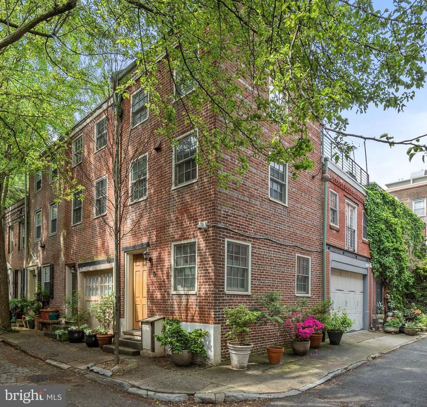 Welcome to this exquisite home located on a picturesque corner in Washington Square West. The unique architectural design has combined 3 historic properties into one and boasts 2380 usable above-ground square feet and is the epitome of modern luxury and city living.

As you step inside, from the attached 2-car garage you will be delighted by the first floor featuring a bedroom, a full bathroom, and office space. 

Make your way to the second level to be greeted by a beautifully designed interior featuring recessed lighting and skylights that flood the space with natural light. The gourmet kitchen is a chef's dream, complete with a breakfast bar, stainless steel appliances, premium counters, and an island - perfect for meal prep. The main level also includes a living room, dining area, den, and powder room, offering versatility and functionality.

The third floor is home to the primary bedroom suite, with an ensuite bathroom that is a true oasis, featuring a separate shower, soaking tub, double sinks, and ample natural light. 

One of the highlights of this home is the roof deck, providing a private outdoor space with breathtaking views of the surrounding area. With central AC, gas heat, and a washer/dryer in the unit, this home offers comfort and convenience in every detail.

Conveniently located on a corner lot with a semi-detached building style, this property also features a large 2-car attached garage, ensuring parking is always hassle-free.

Don't miss the opportunity to make this remarkable property your new home. Schedule a showing today and experience luxury city living at its finest!