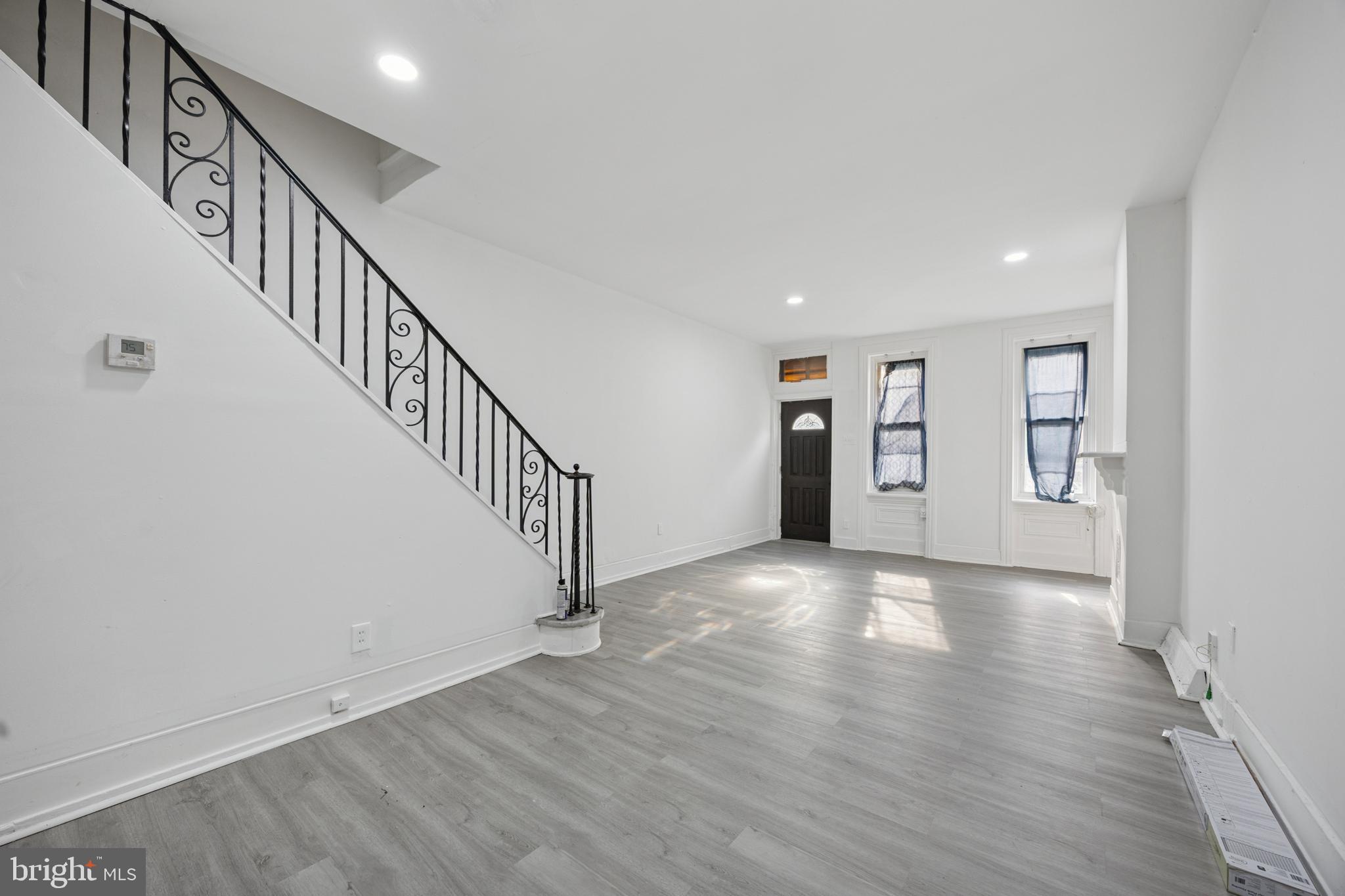 Welcome to 2416 N. Carlisle Street – a freshly updated home just minutes from Temple University. This spacious property features new laminate flooring throughout both levels and has been fully repainted creating a bright, airy feel enhanced by elevated ceilings and abundant natural light. The first floor spacious living room and kitchen. You also have a huge backyard to entertain family and friends and have summer barbeques. Upstairs, you'll find three bedrooms and a full bath with tub. The basement offers washer/dryer and generous storage space. Located between Temple’s Main Campus and its medical and dental schools, this home is ideal to live in or for student housing or investment. Temple University Hospital and Shriners Children's Hospital are nearby.