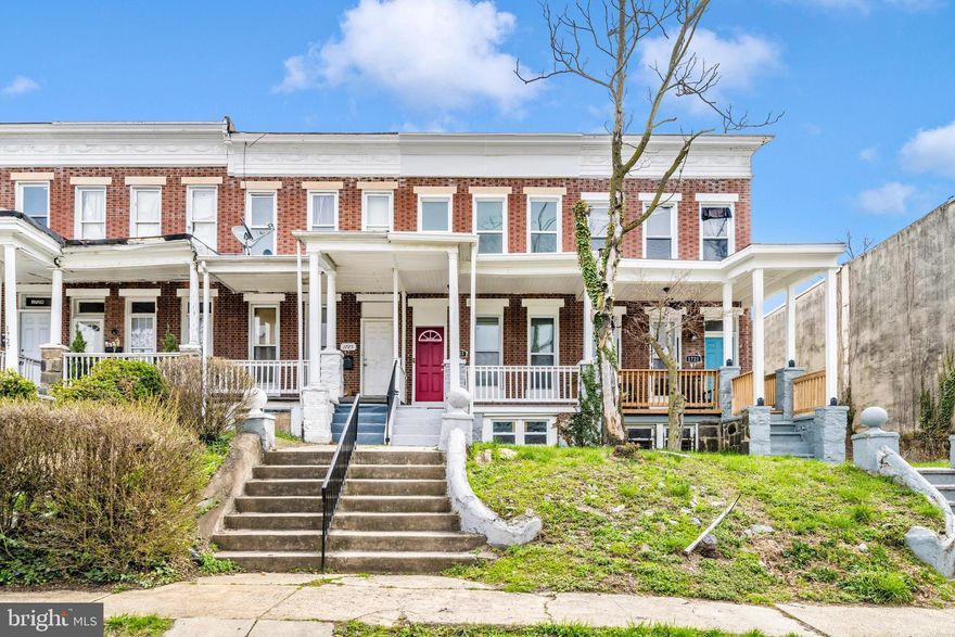Welcome to this beautifully updated brick-front rowhome with a covered front porch, perfectly blending modern finishes with classic charm. Step inside to discover LVP flooring flowing throughout the main level, creating a stylish and low-maintenance space. The inviting living room offers the perfect setting to entertain guests, while the dining area provides a great space to gather and enjoy meals just off the kitchen. The fully updated kitchen is a true highlight, featuring new cabinetry, sleek quartz countertops, a tile backsplash, and stainless steel appliances. Convenience is key with a main-level powder room and laundry room, adding everyday ease to your routine. Upstairs, you’ll find a spacious primary bedroom filled with natural light, complete with a large closet and brand-new carpet. Two additional bedrooms and a beautifully updated full bathroom with a custom tile tub/shower combo offer comfort and flexibility for family, guests, or a home office. The lower level is unfinished, providing ample storage or the opportunity to customize the space to fit your needs. Step outside to a fully fenced backyard, perfect for hosting summer BBQs, relaxing, or creating your own outdoor oasis. Ideally located near Route 40, Coppin State University, Mondawmin Mall, and a variety of shops and restaurants, this move-in ready home offers both convenience and modern living. Don’t miss your chance to make it yours!